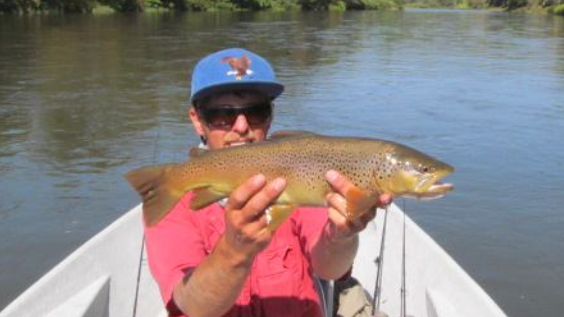 9/24/15 Guide Evan P. displays a 19" brown caught by Andy S.