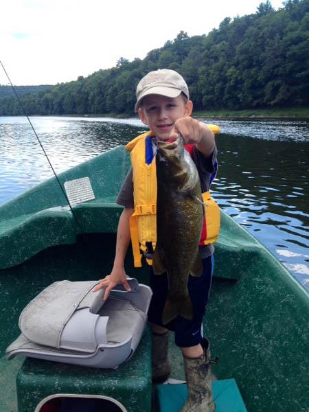 Little Guy Reese with a Lunker 20" Smallmouth bass