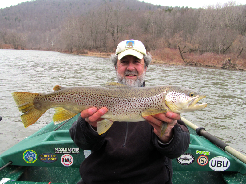 Guide Mike P. with an early season two footer. 24" Brown trout