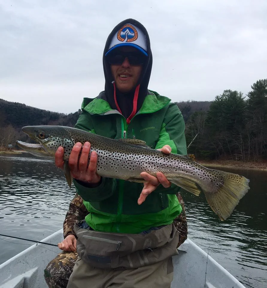 4/10/16 Guide Evan P. connects with a 23" male Brown trout. On a dry fly.