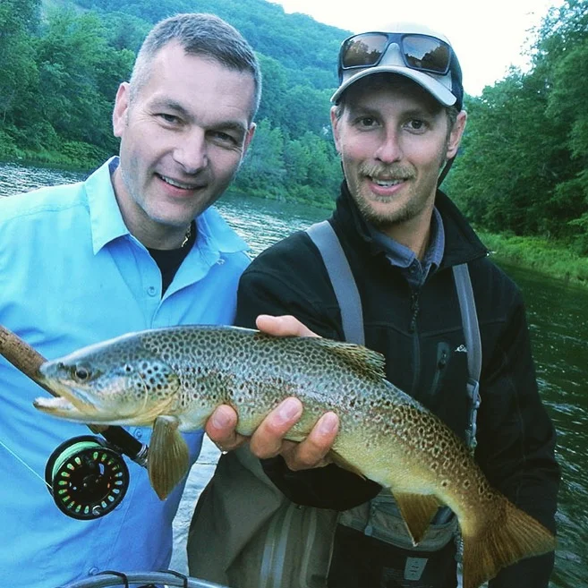A first fish on a fly rod for Steve. 19 " brown trout!!