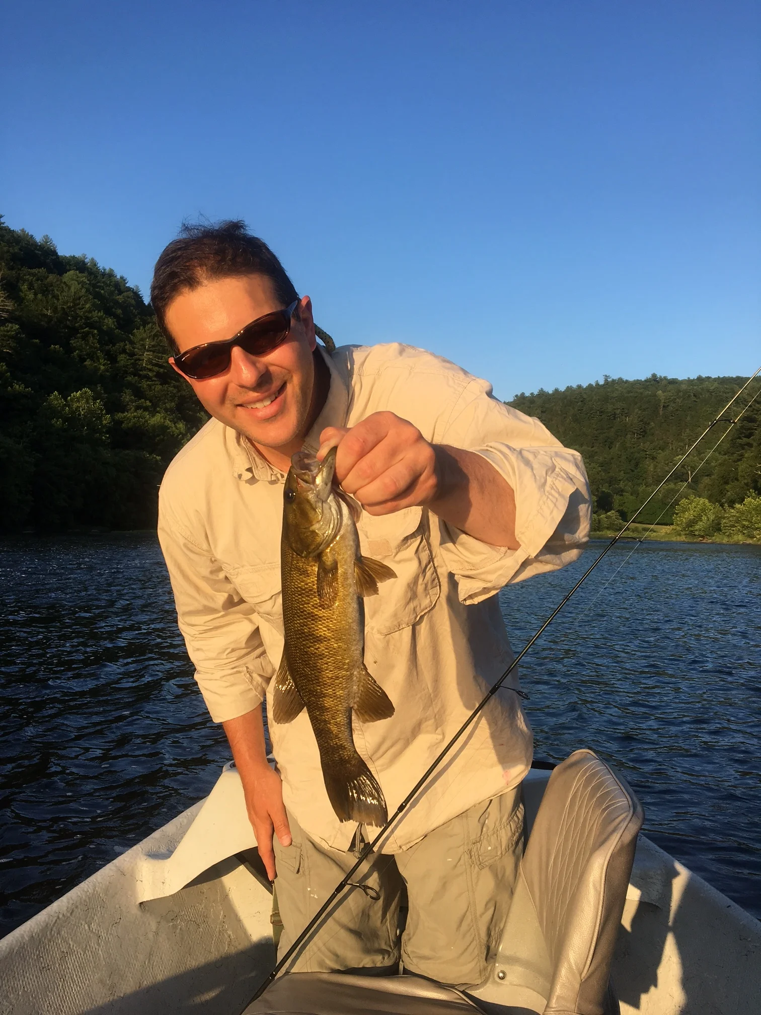 07/19/16 Ricky L. With a sunset smallmouth.