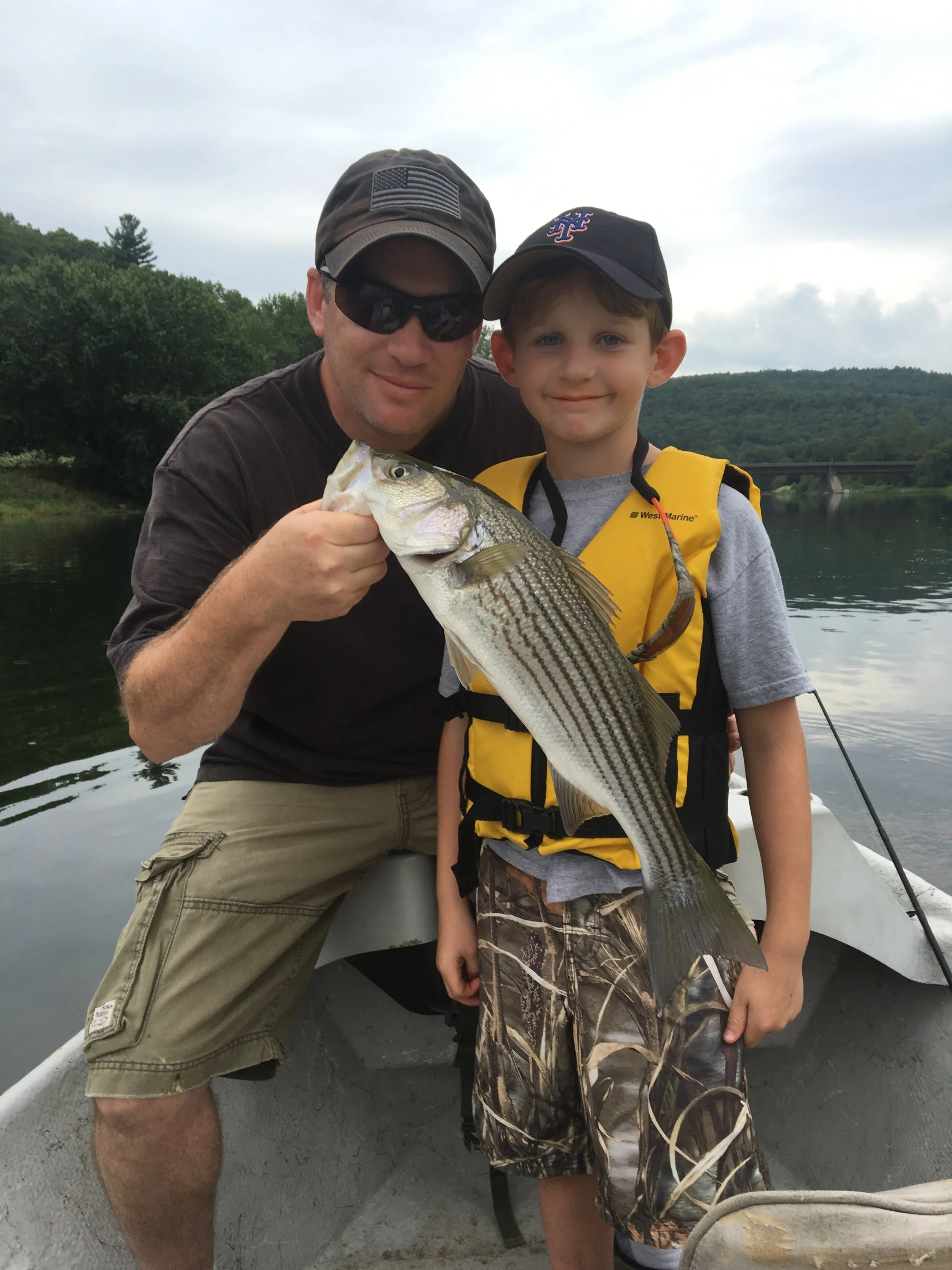 A nice 21" Smallmouth Bass for Rick L. and his son.