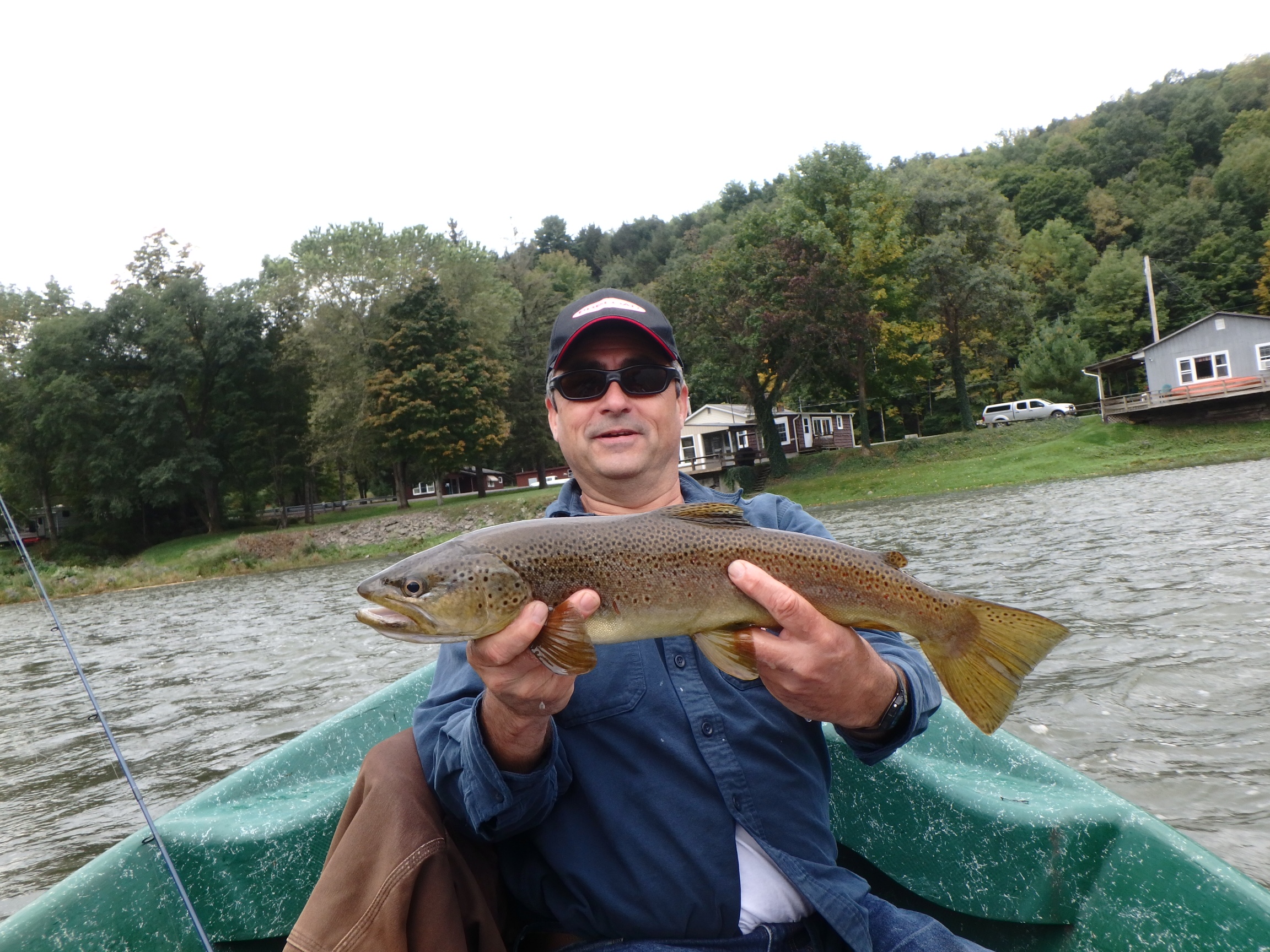 Tony D. with a beautiful 21" brown from the west branch.