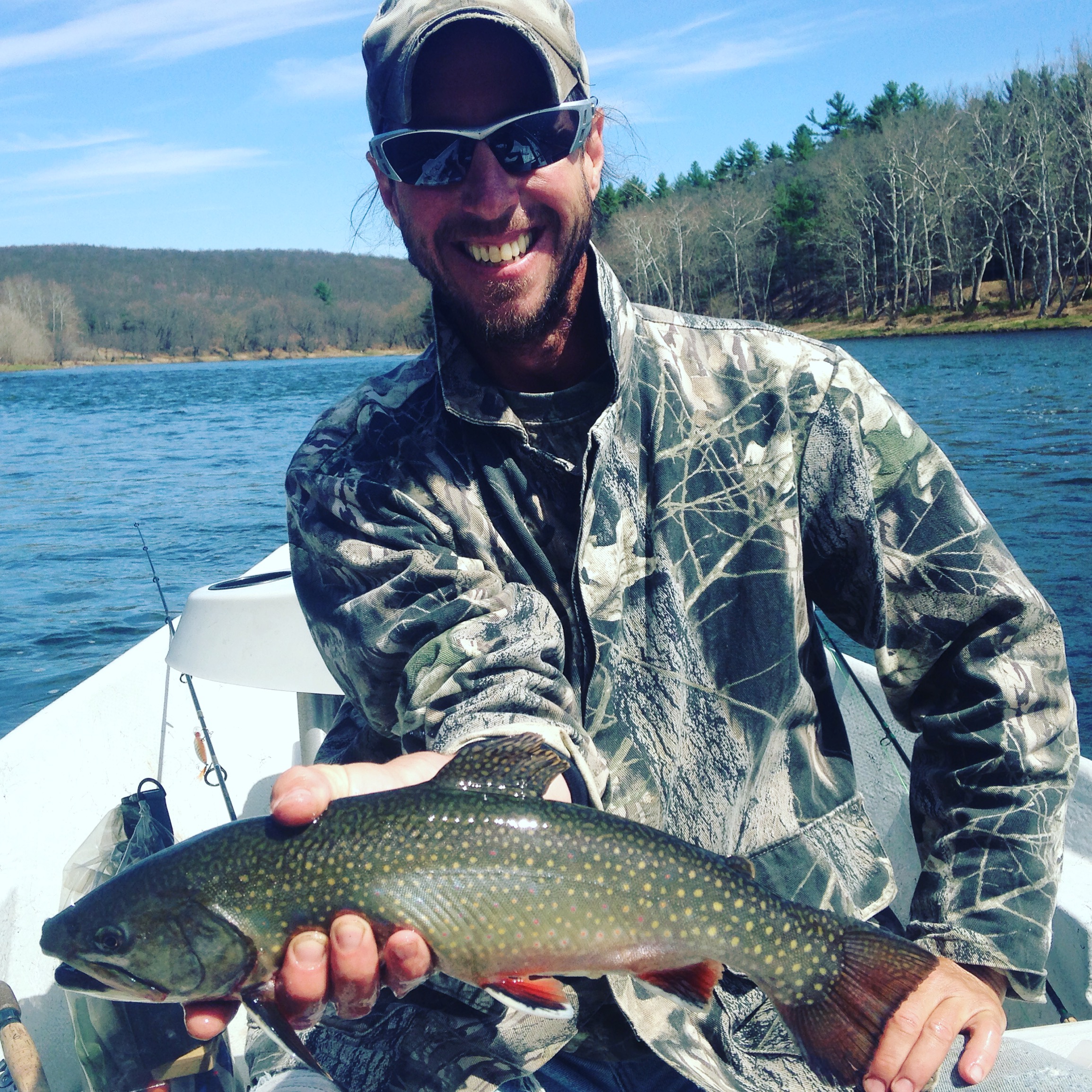 A trophy of an 18" Brook Trout caught on the main stem. 