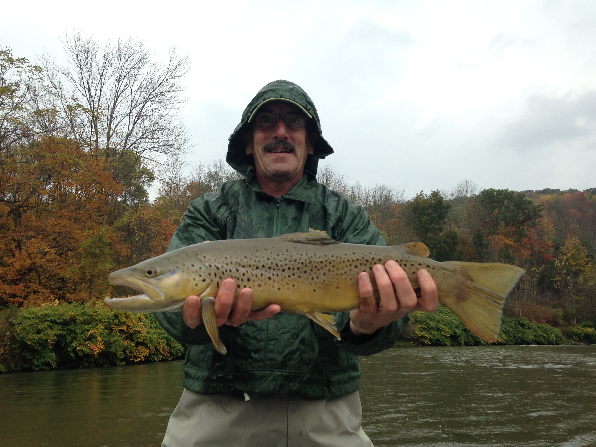 George W. with a 23" mean looking Brown trout.