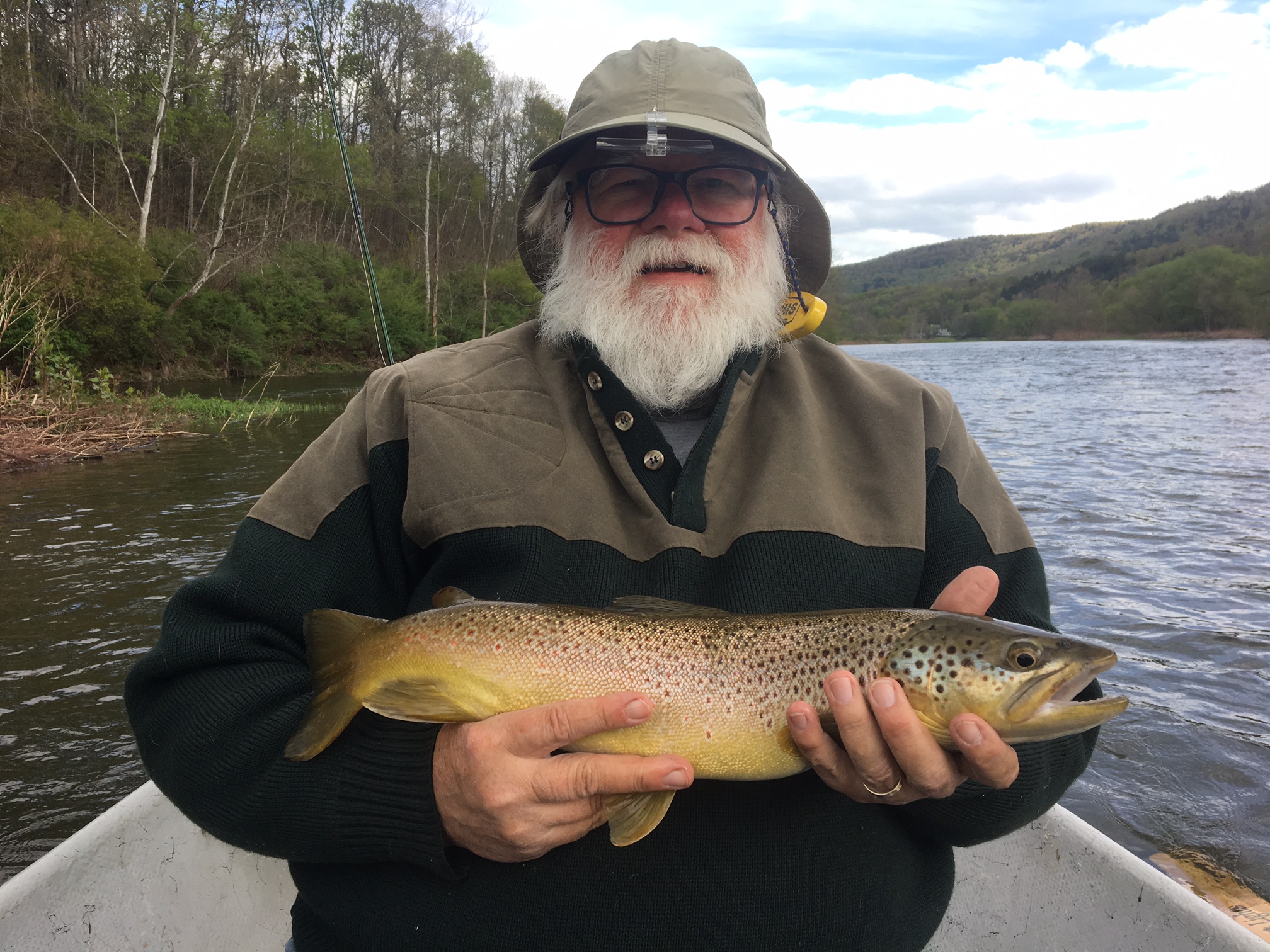 Jim K. with a 20" brown on the dry fly.