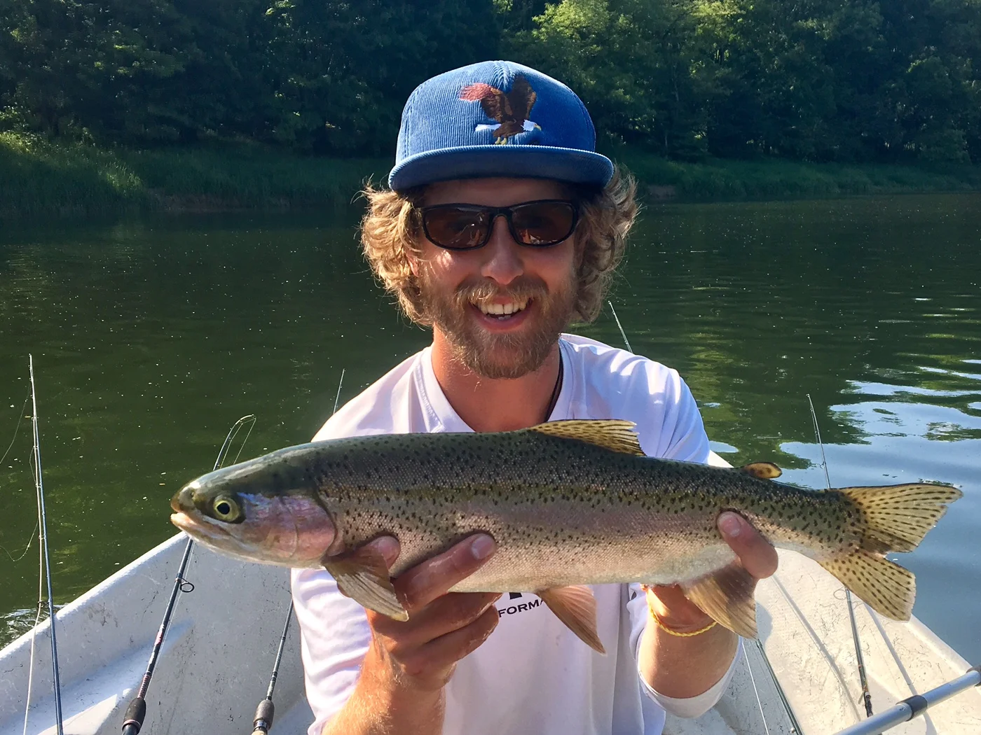 Guide Evan P. with a 20.5" Rainbow on the dry fly.