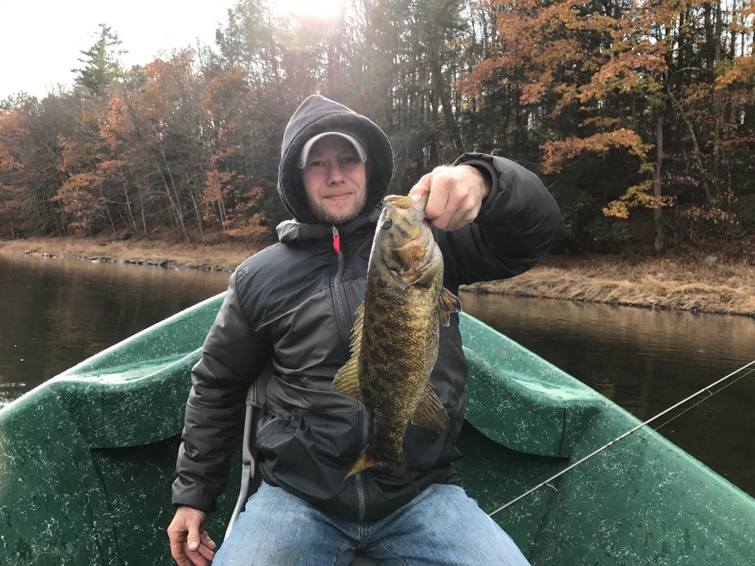 Craig T. jigs up this beautiful 18" Smallmouth Bass.