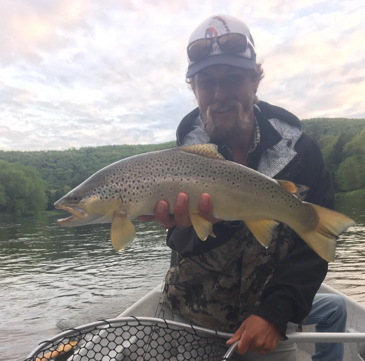 A chunky 18" Brown on a dry fly for Guide Evan.