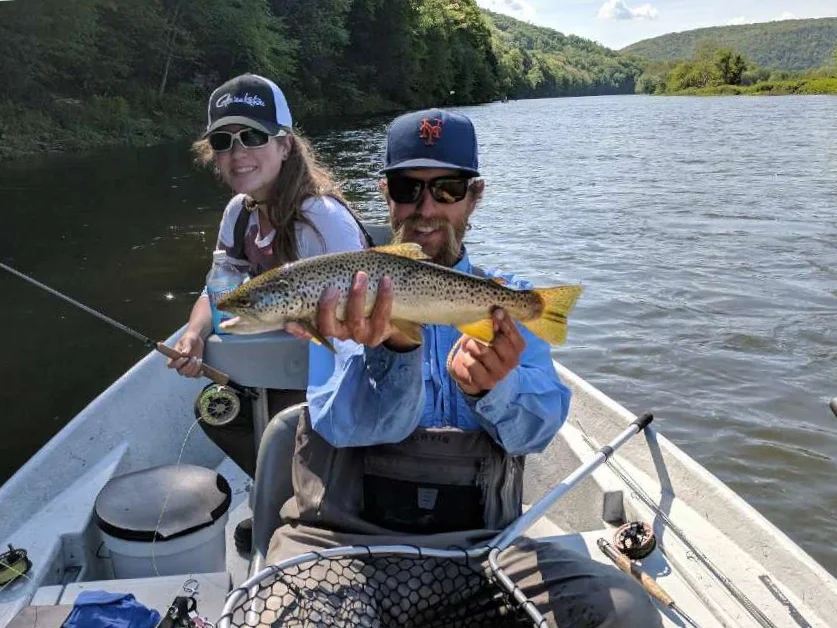 The youngin battled this Brown trout to the net.