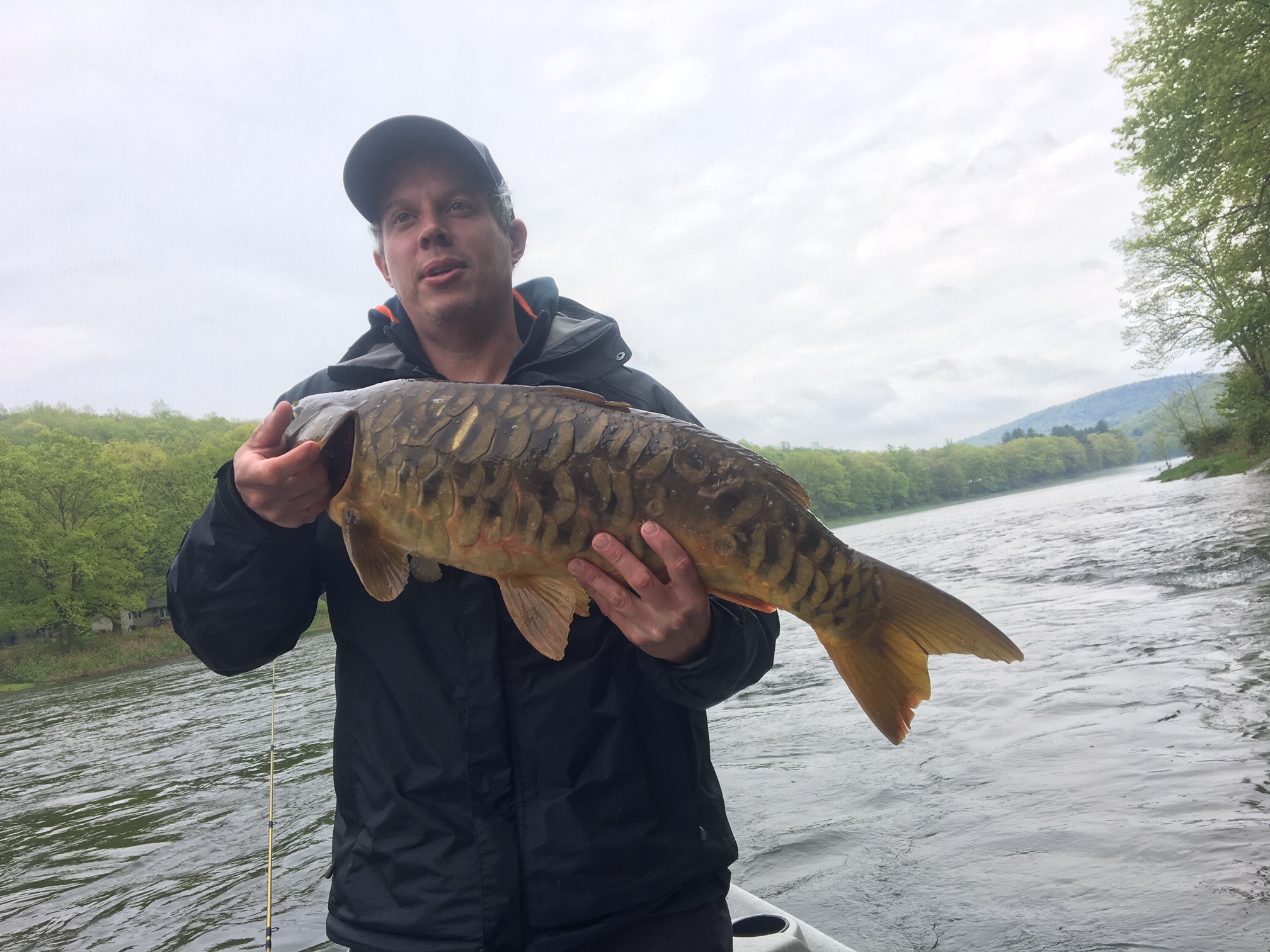 Brian holding a rare catch of a Mirror Carp this fish weighed 12lbs.