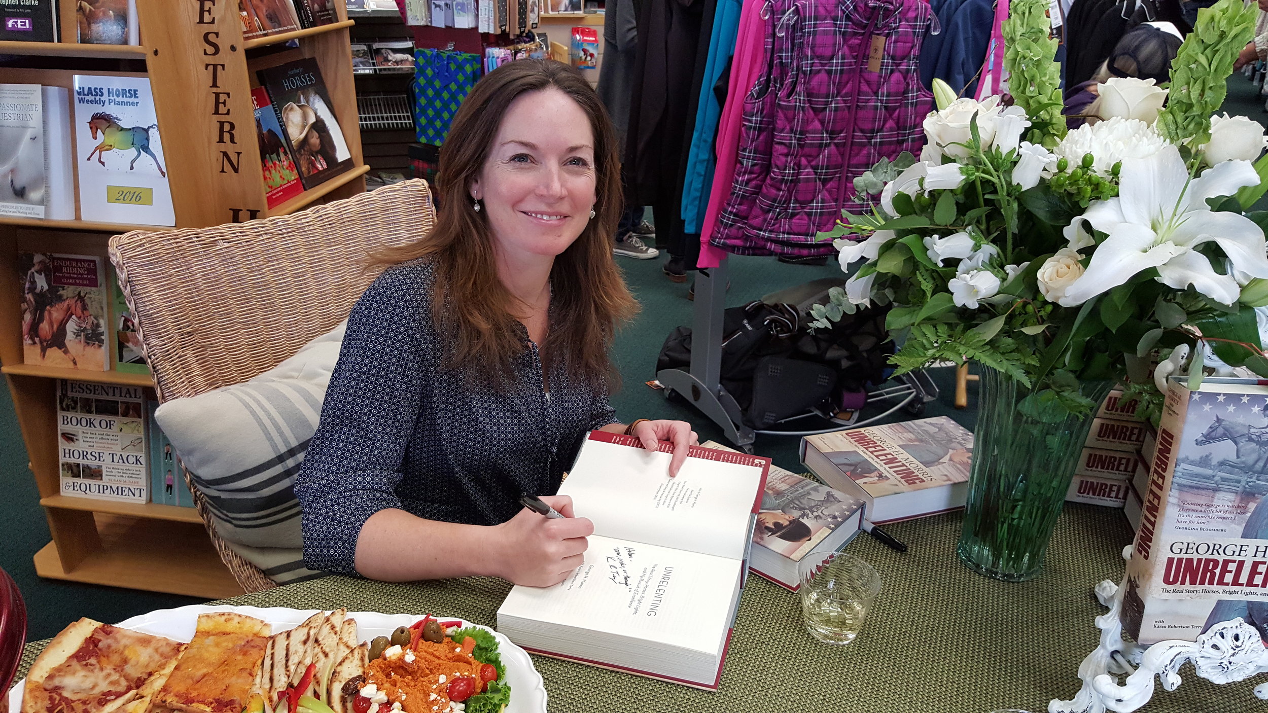 Karen Robertson Terry signing our copy of UNRELENTING.