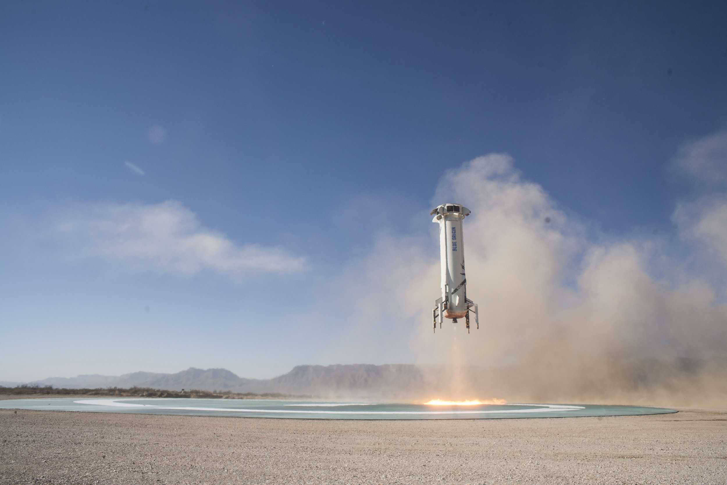 Blue-Origin-New-Shepard-Mission-7-Booster-Landing-2.jpg