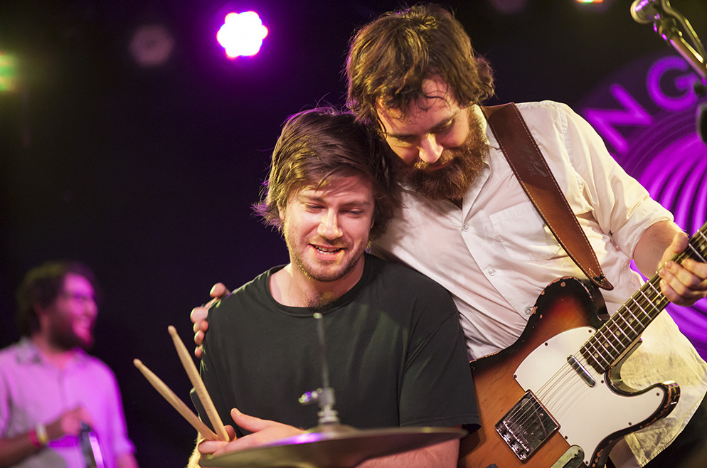 Elroy playing drums in brother Liam’s band