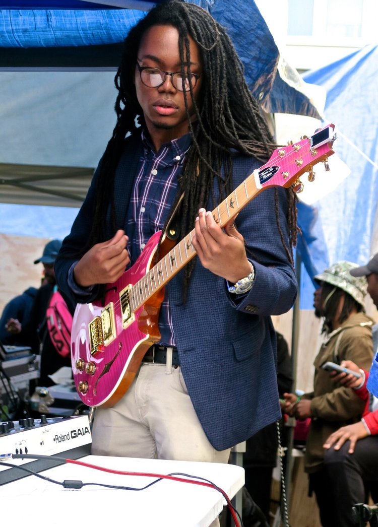 Kwesi Lee of Nag Champa performing at Funk Parade 2017. Photograph by Maxwell Young