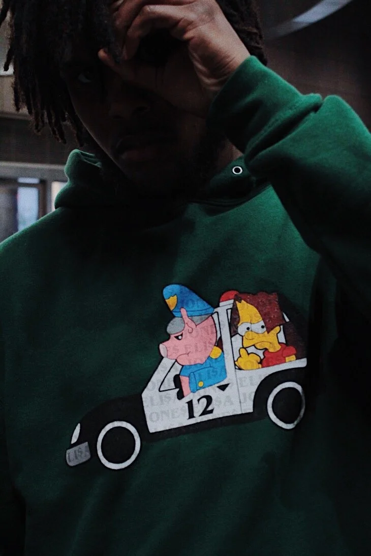 David Cole wearing the “Bart 12" Elisa Jones hoodie | Photograph by Alex Young