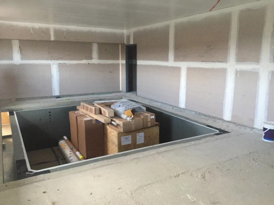 The hydrotherapy pool with treadmill is being installed...