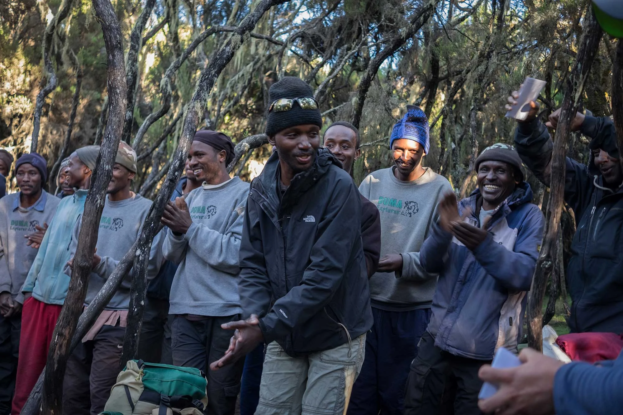 Head guide, Michael leads the entire team in a traditional Swahili song.