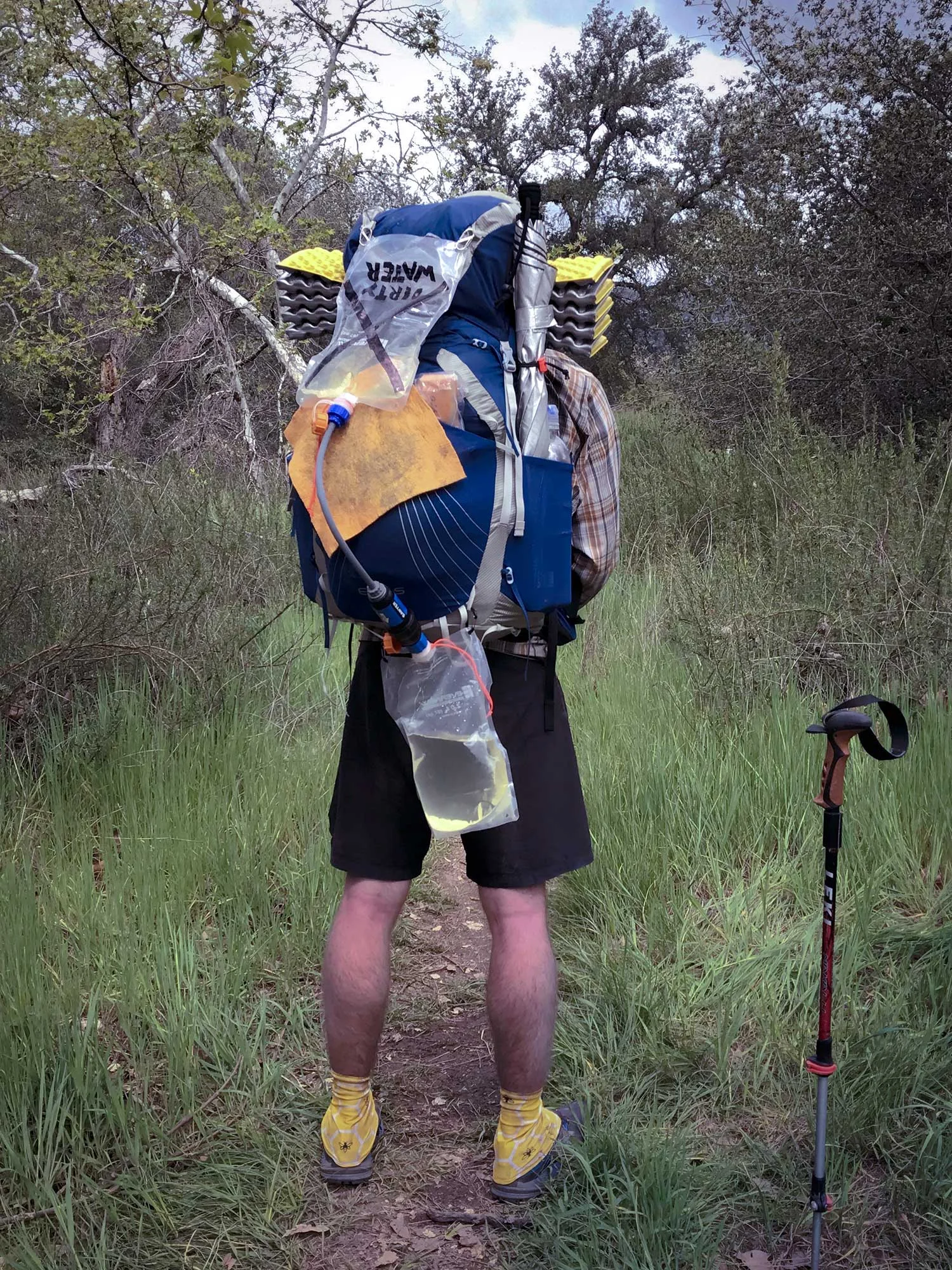 There I am on Day 2 of the PCT with my shiny gravity filter. Couldn't walk with it, and hanging it was a pain. Learn from my mistakes. Less is more.