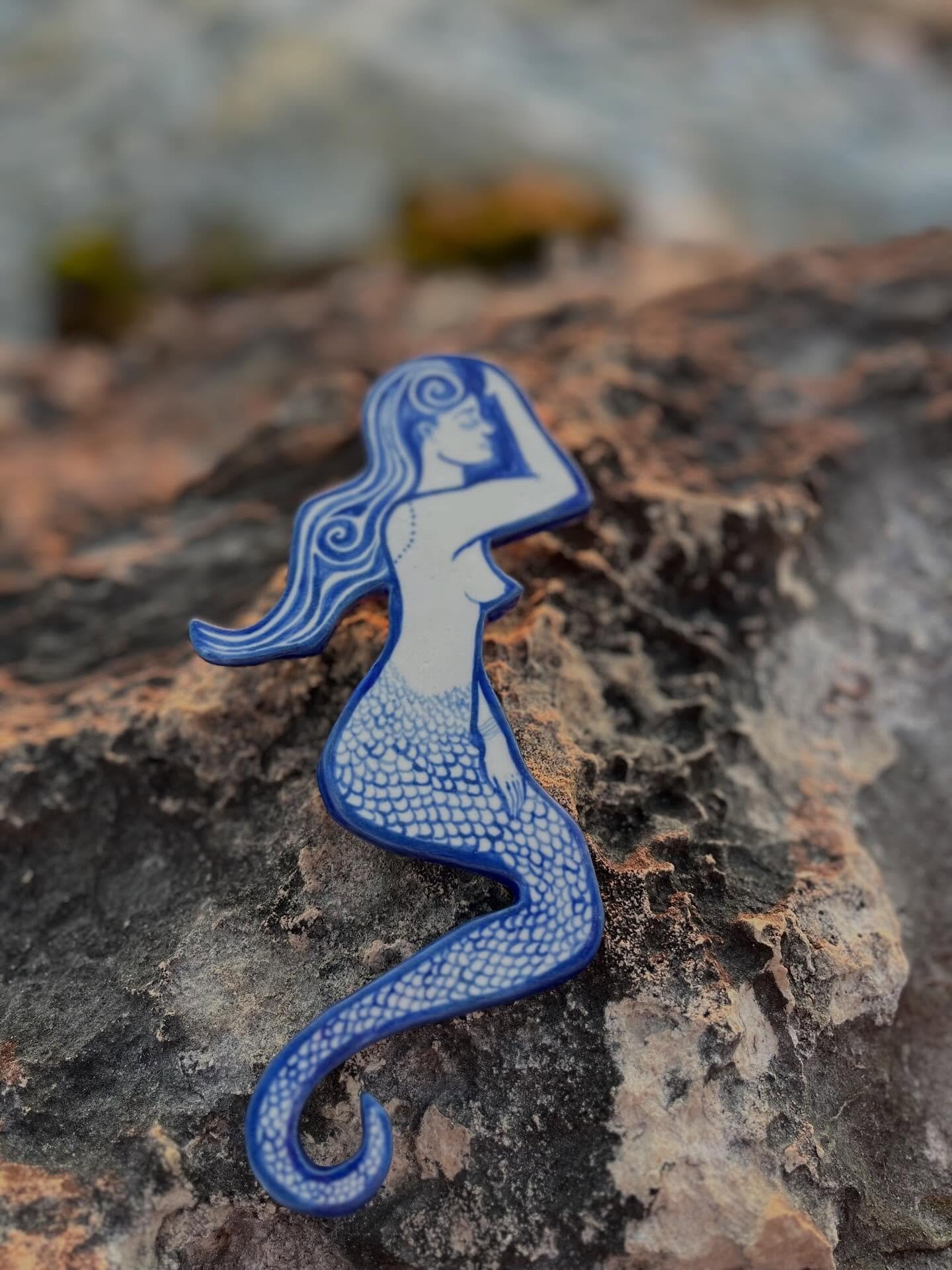 Porcelain Mermaids | Hand painted

Hand painted in blue underglaze and then quick chip in clear glaze. Inspired by trips to Italy and coastal Greek towns.