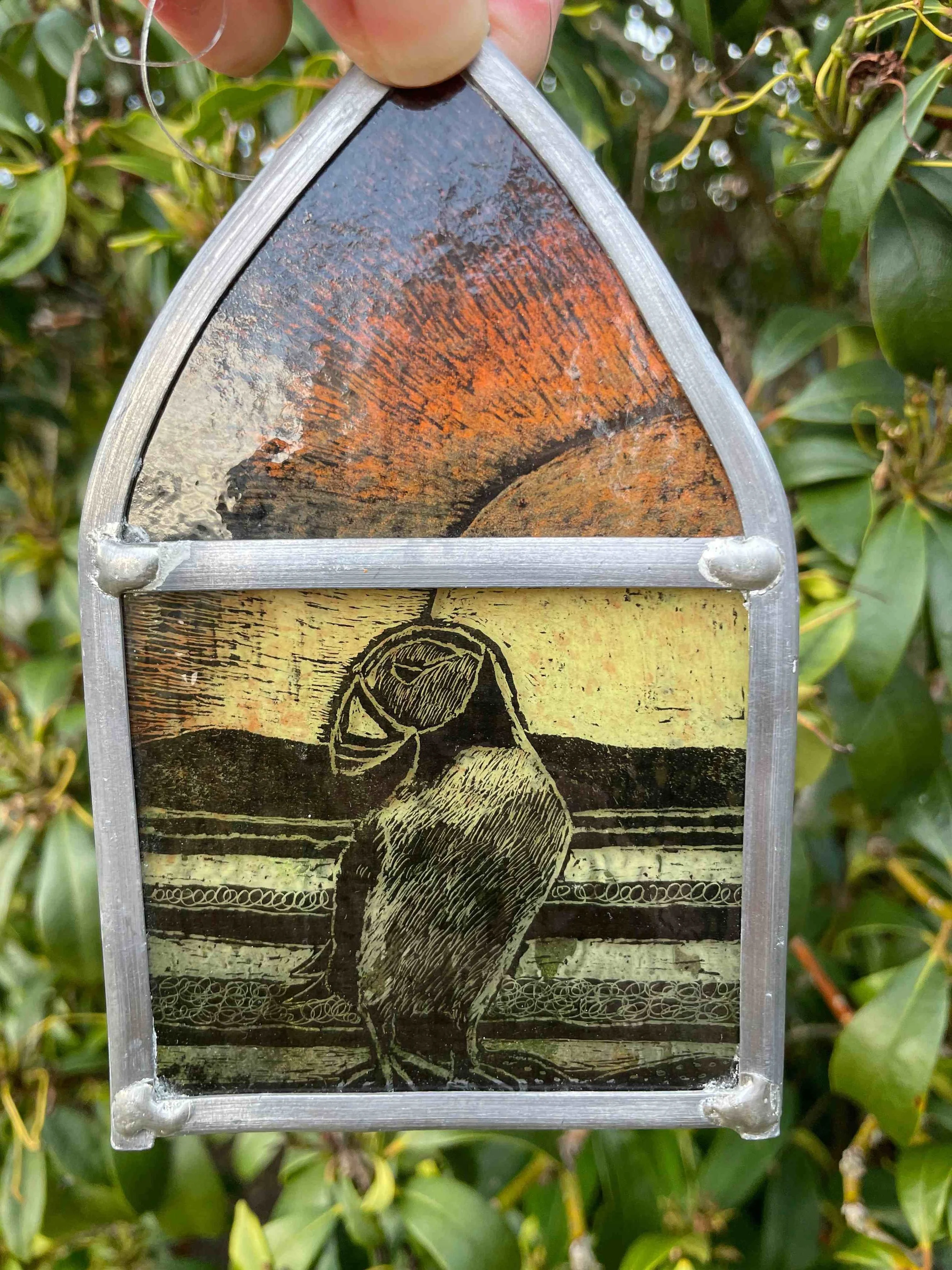 SMALL STAINED GLASS HANGING< PUFFIN