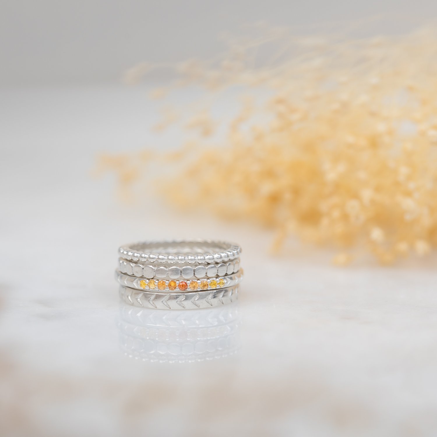 styled-stacking-rings-with-ombre-yellow-sapphire-unicorn.jpg