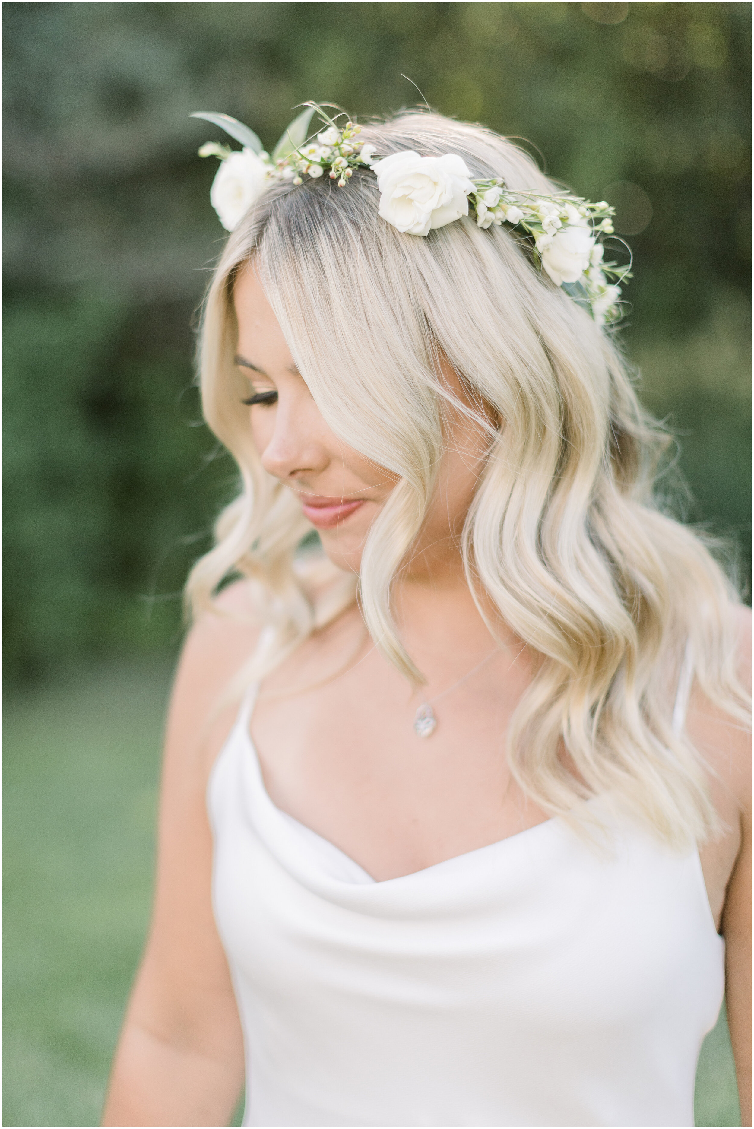  Beautiful bride with beach curled hair and simple white floral crown by Chelsea Morgan Photography in Ottawa, ON. boho hair inspo ideas for wedding hair simple wedding hair beach waves for wedding floral crown for wedding hair goals for wedding best