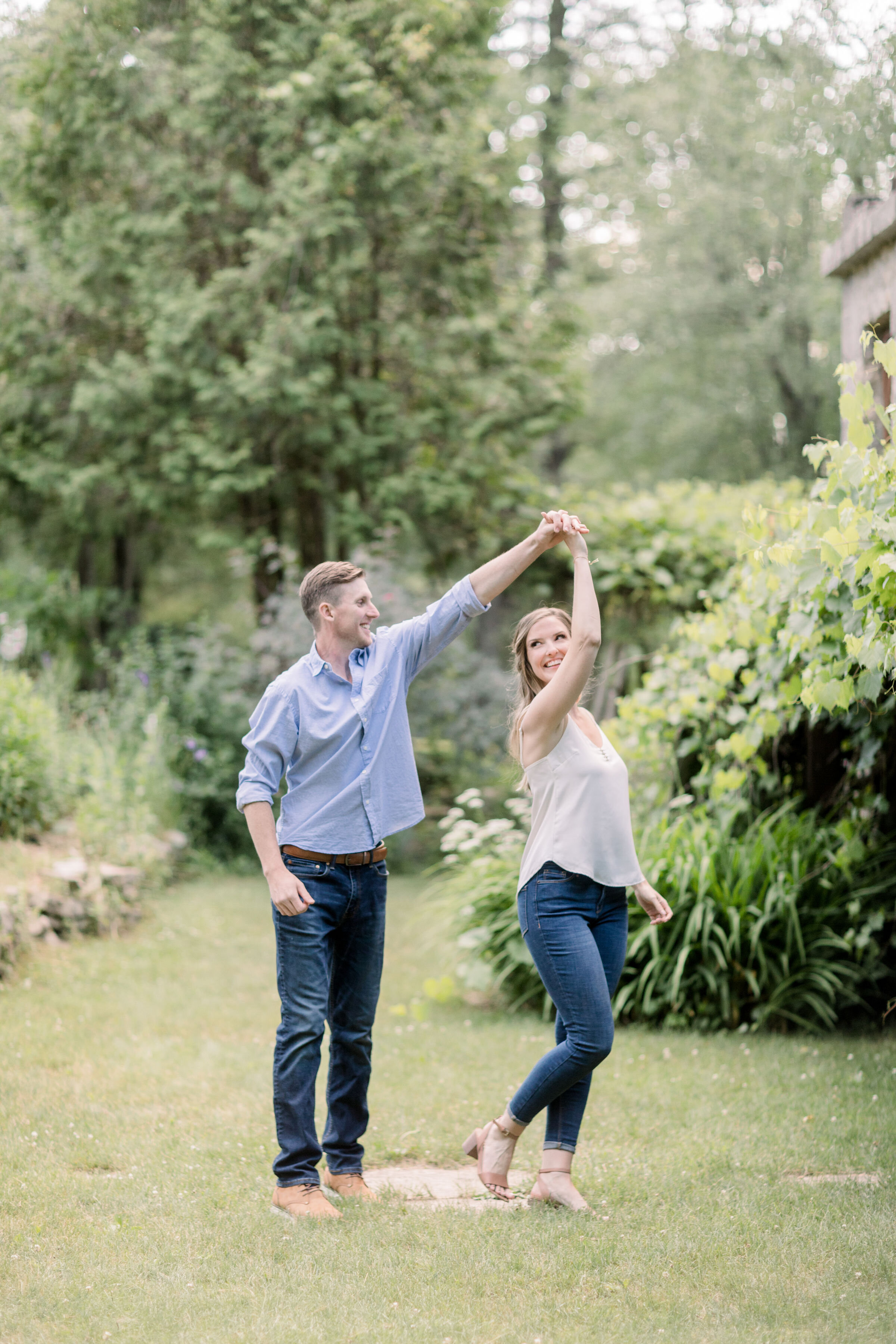  Cute shot of couple dancing during engagement photo session for a candid photography moment by Chelsea Mason Photography in Ottawa, ON. how to shoot engagements best poses for engagements couple poses couples dancing for pictures candid engagement p