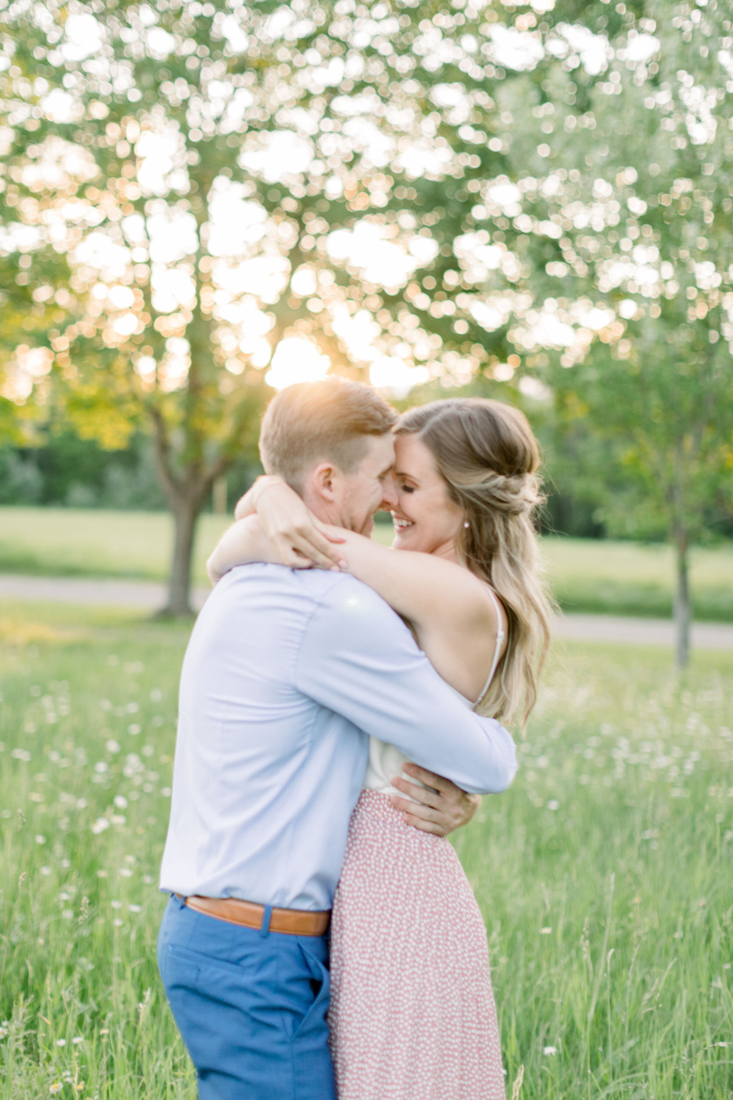  Perfect outdoor lighting right at dusk with sun peeking through trees for this engagement photoshoot in Ottawa, ON by Chelsea Mason Photography. perfect photo lighting lights in trees how to capture perfect lighting outdoor engagement locations in o