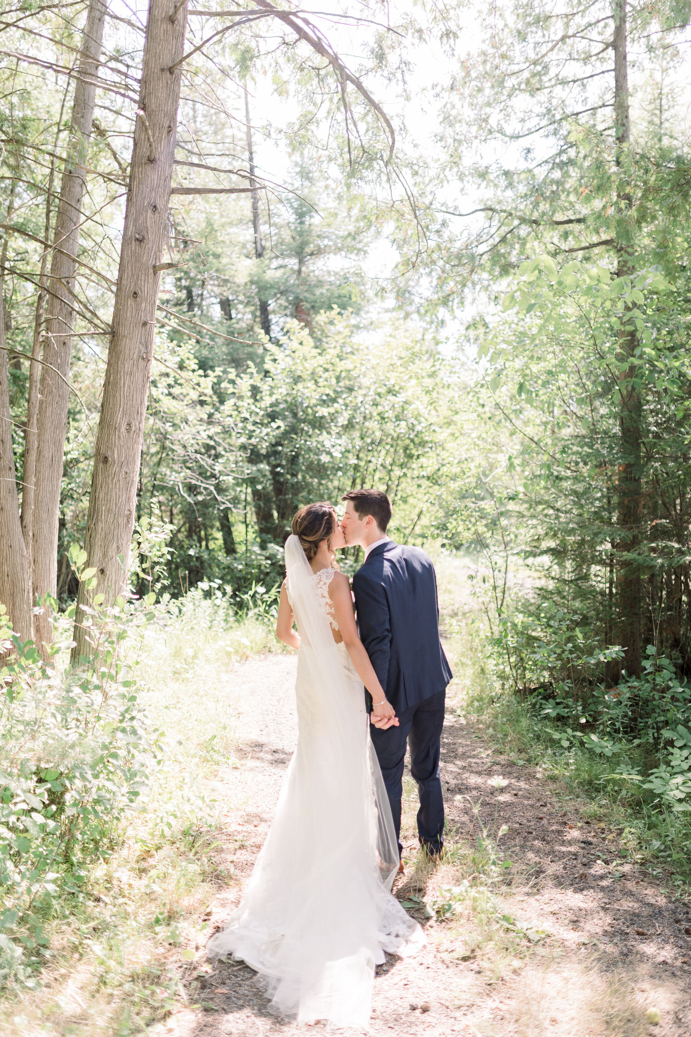  Beautiful wooded location for bride and groom formals on a nature trail with great natural lighting in Ottawa, ON by Chelsea Morgan Photogprahy. wooded location for photoshoot in ottawa woods for photoshoot in ottawa great lighting for bride and gro