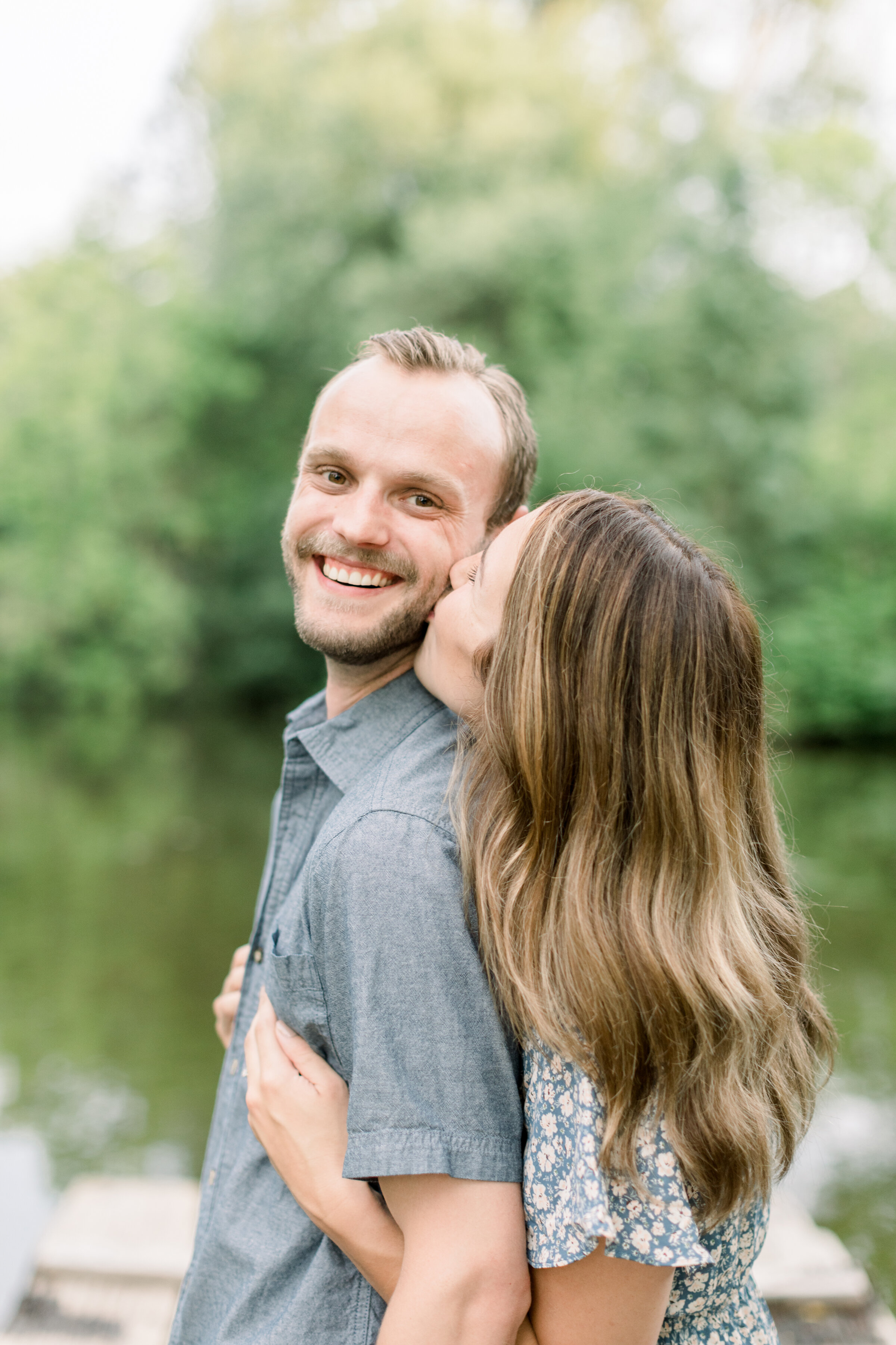  Adorable couple wearing blue button down shirt for outfit inspo for your future groom in Ottawa, ON by Chelsea Mason Photography. what should he wear in engagements colors for engagements outfit inspo for engagements couple outfit inspo blue and whi