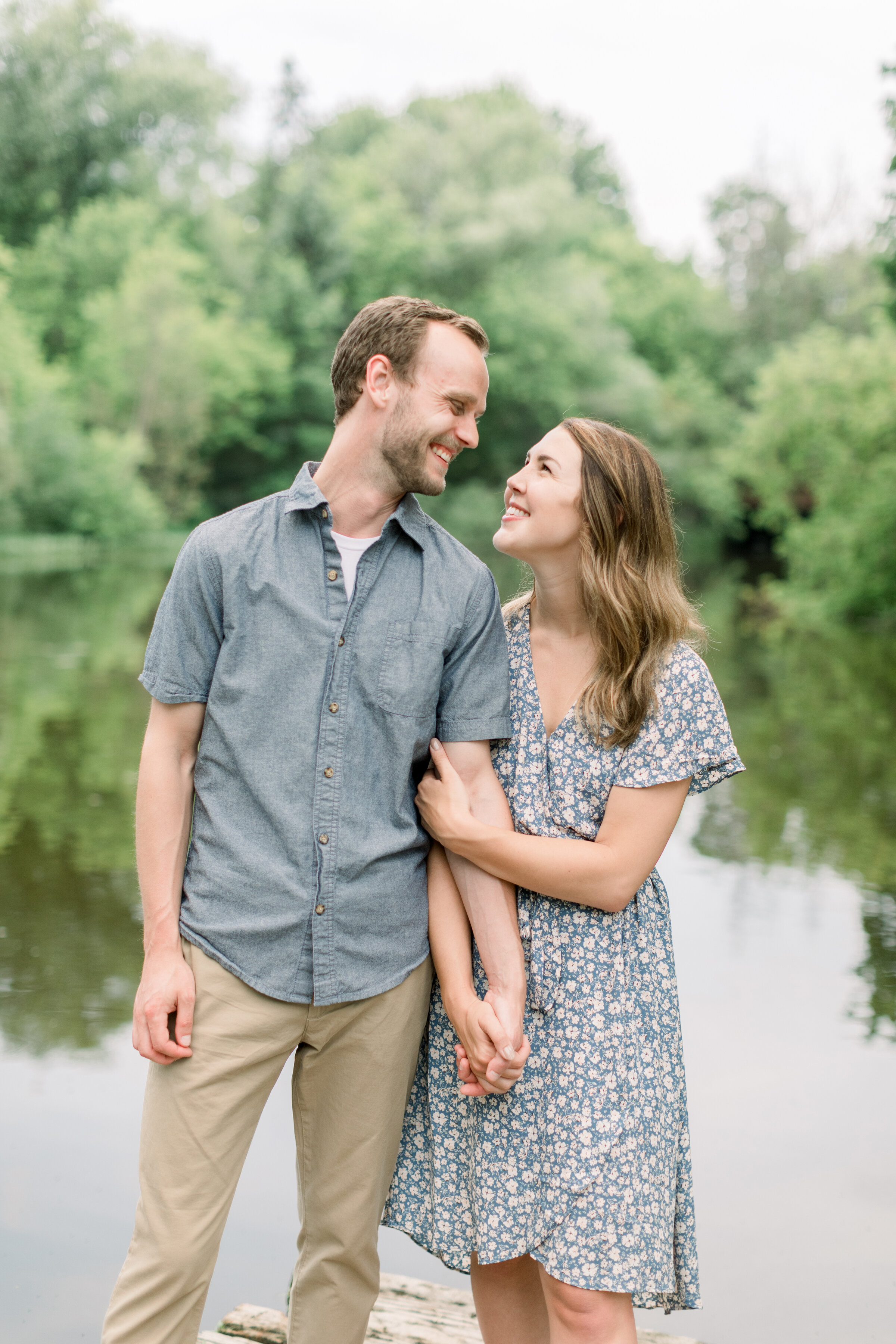  Perfect engagement photoshoot for a summertime location in Ottawa, ON by Chelsea Mason Photography with a lake and a dock. green photoshoot locations in ottawa lake locations for photoshoots in kingston best places for engagements in carleton place 
