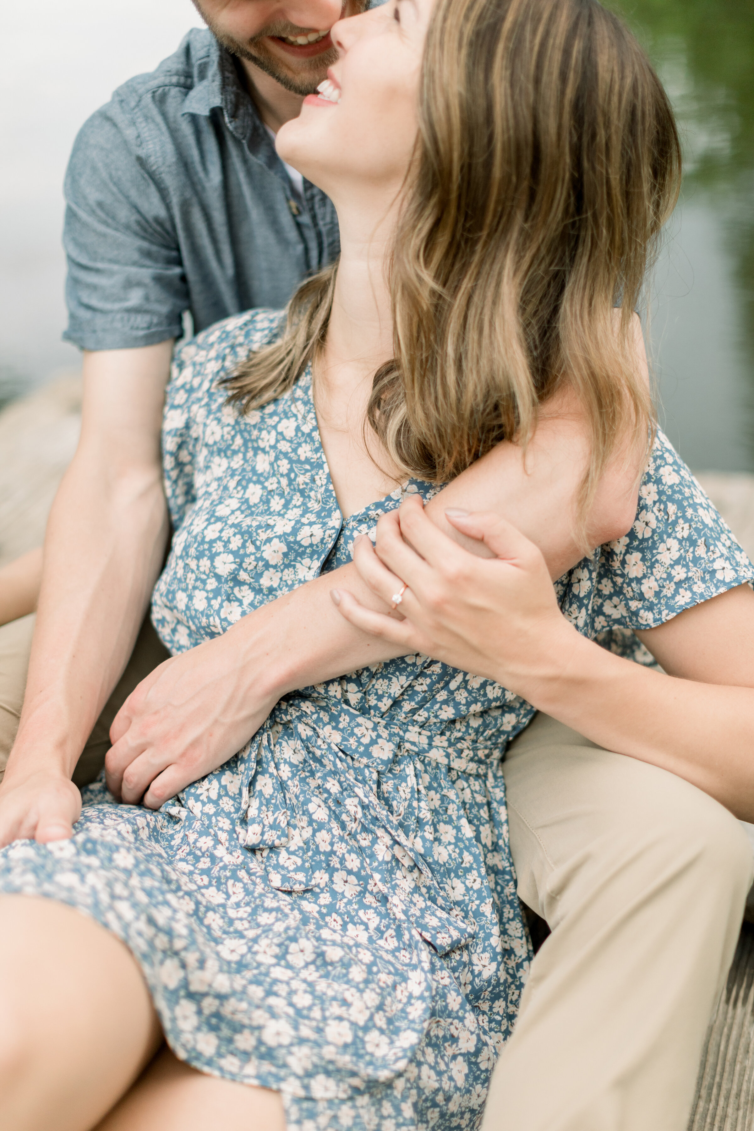  Beautiful couple wearing blue and white dress and khakis for engagement photoshoot with beautiful gold band ring and simple diamond in Ottawa, ON. chelsea mason photography best wedding photographer in ottawa perth wedding photographer outdoor engag