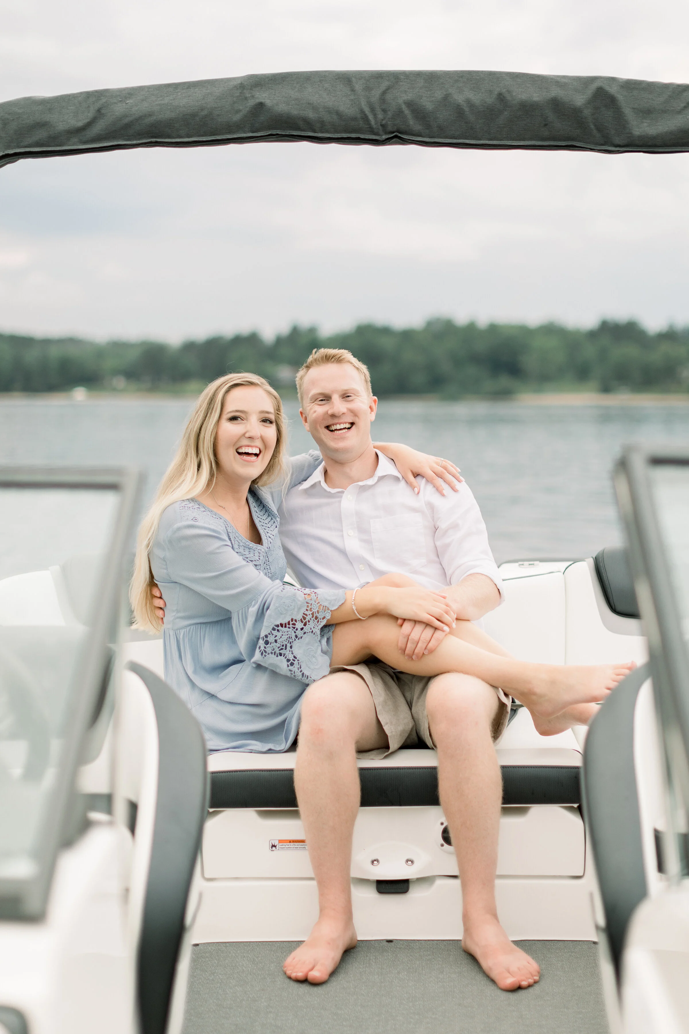 Outfit inspo for summer engagement photoshoots with blue and white colors at a lake in Ottawa, ON by Chelsea Mason Photography. outdoor photoshoot locations in ottawa what colors should we wear for engagements what to wear at engagements summer colo
