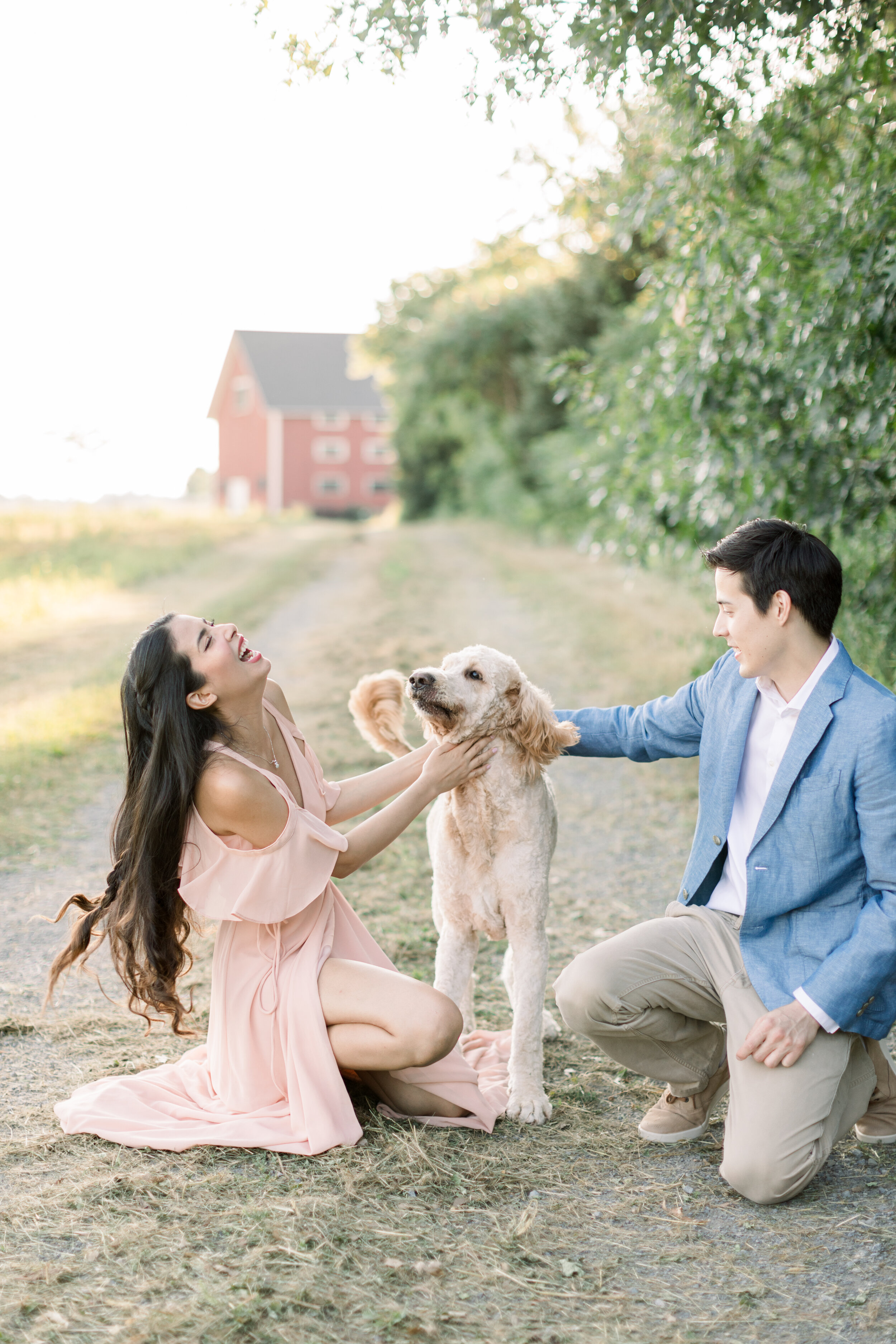  Beautiful couple taking engagements photographs with their pet dog in Ottawa, ON by Chelsea Mason Photography. aboretum photoshoot locations outdoor locations for photoshoots in ottawa engagement couple outdoor photo locations in ottawa couple outfi