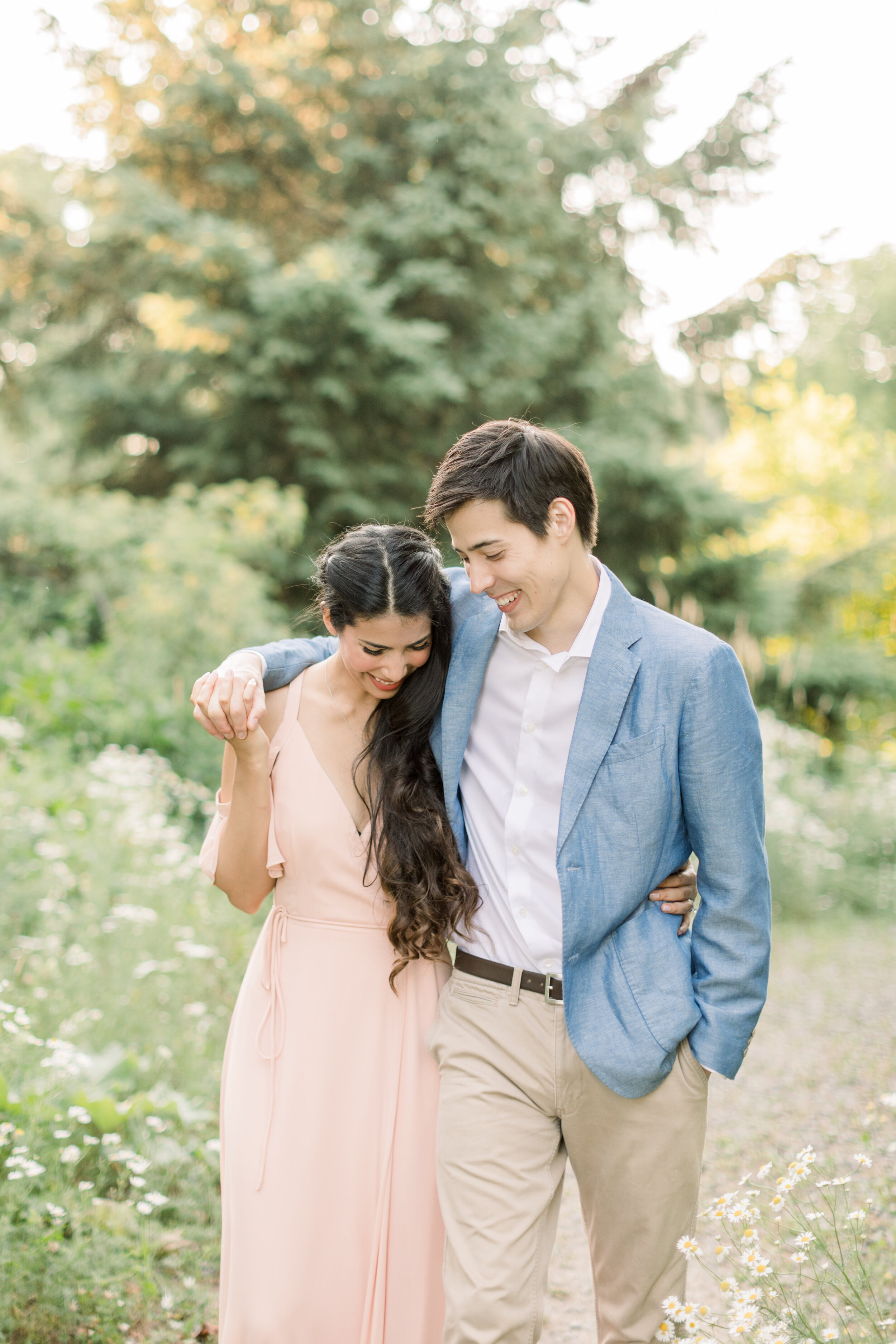  Beautiful couple in ideal outdoor location at arboretum in Ottawa, ON by Chelsea Mason Photography. outdoor location for engagements best place to take photos in ottawa where should we take engagements in ottawa how to dress for engagements best out