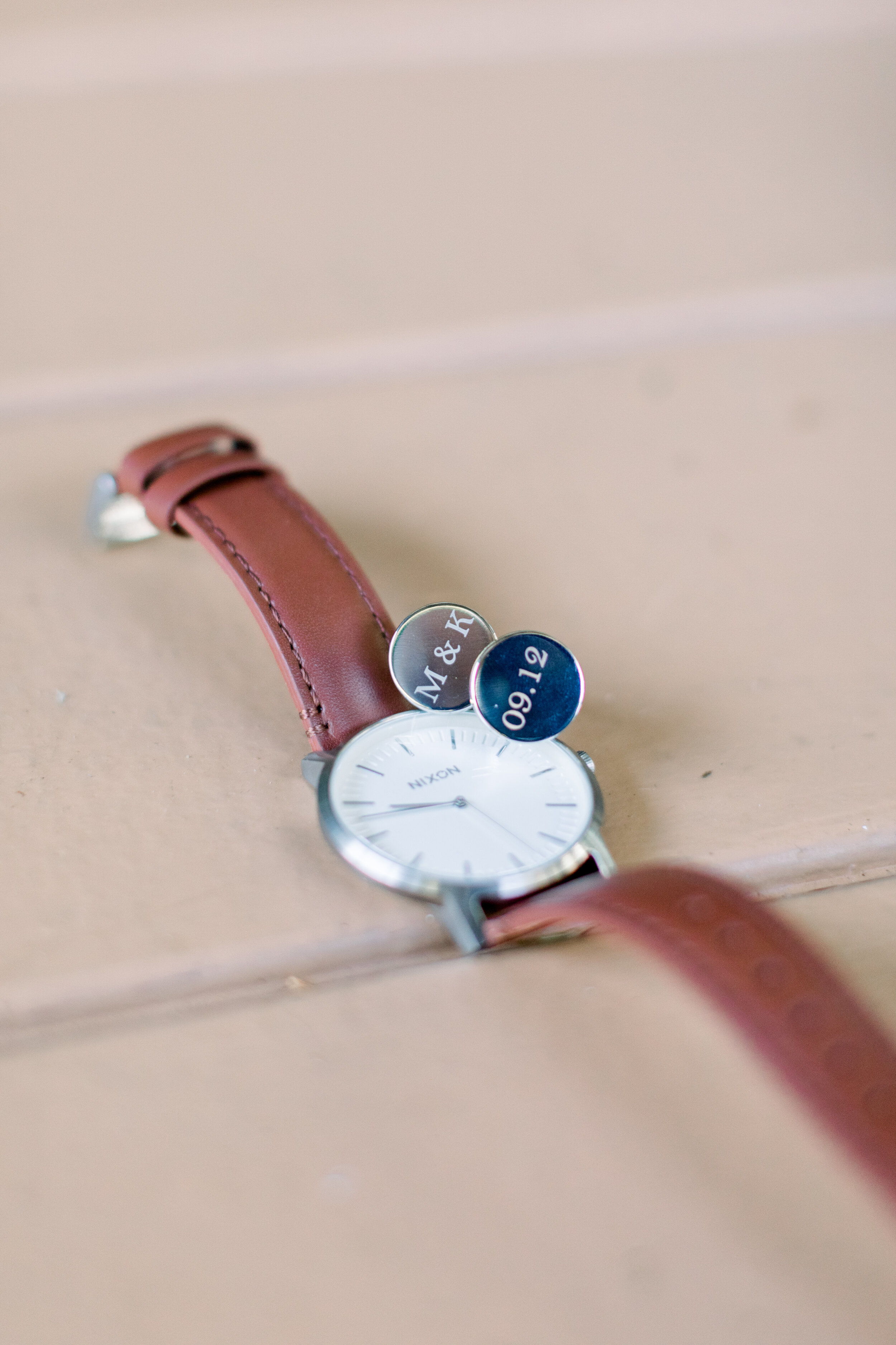  Looking for unique accessories for the groom? Check out this watch and cuff links with the wedding date engraved. Close up on wedding accessories for the groom groom aesthetic inspiration ideas and goals mementoes for the groom and groomsmen wedding