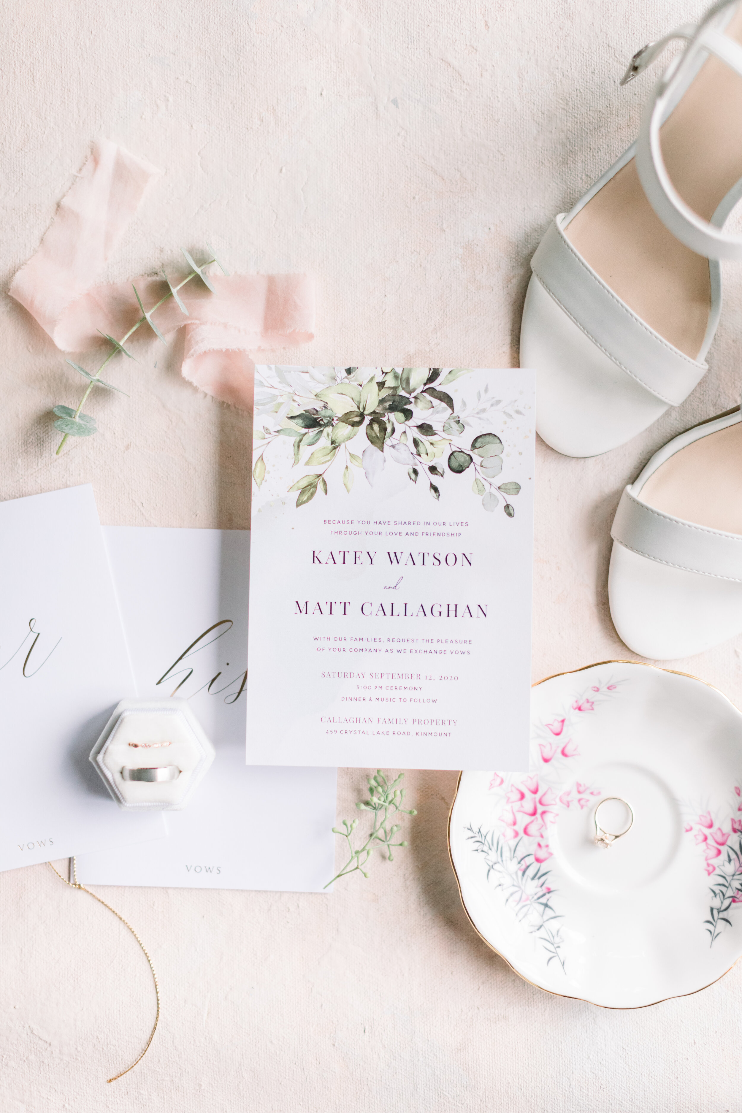  A beautiful close-up shot of all the wedding day details for this beautiful backyard wedding in Ottawa, Canada with Chelsea Mason Photography. Wedding rings diamonds bride pink flowers invitations invites bridal shoes table decor white elegant weddi
