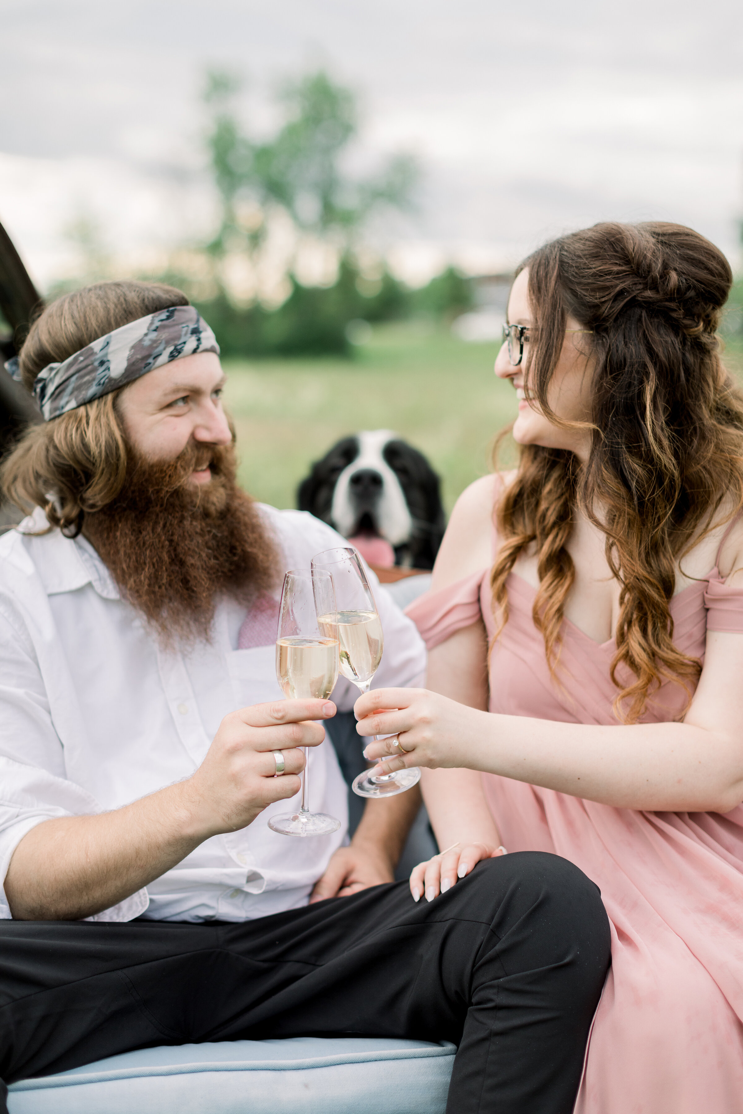  Cheers to a wonderful new life together in a beautiful rustic outdoor engagement session by Chelsea Mason Photography. Couple goals engagement session ideas and inspiration for fun and unique session Smith Falls, Ontario Canada couple pose inspirati