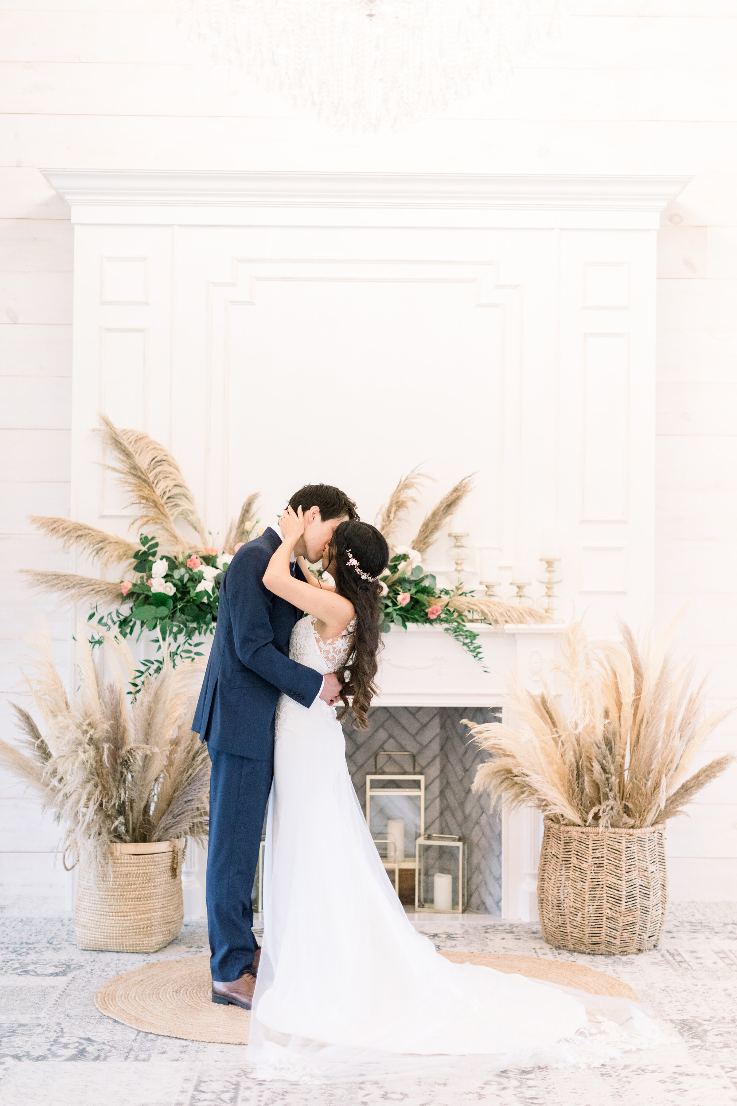  A stunning couple kiss at the wedding alter in a beautiful wedding day photo shoot at Stonefields Estates, Carleton Place, Ottawa by Chelsea Mason Photography. Wedding alter inspiration ideas and goals kissing couple pose inspiration ideas and goals