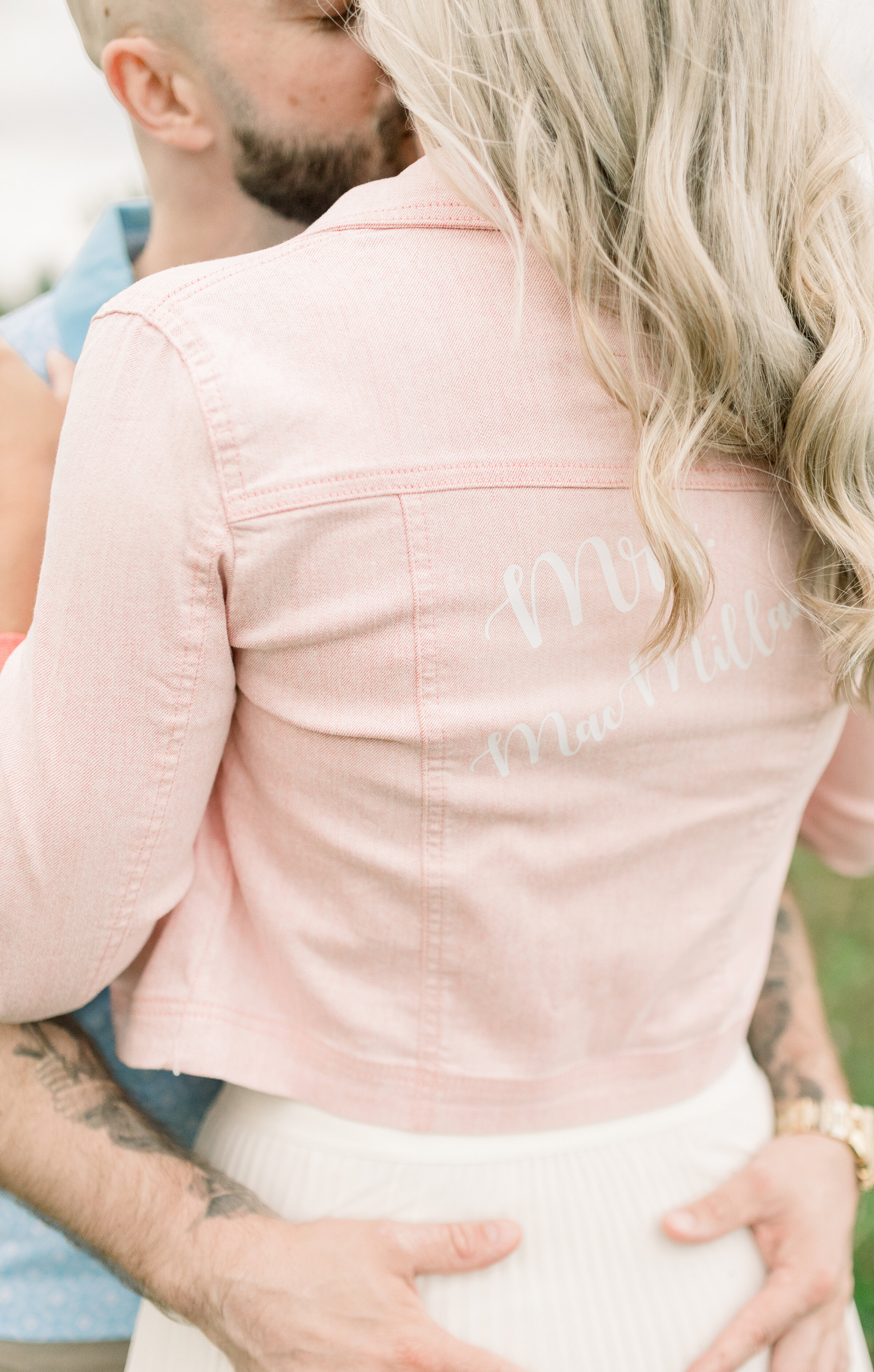  A handsome groom holds his soon to be wife close as they kiss in Ashton, Ontario. Chelsea Mason Photography women’s pink jean engagement jacket inspiration ideas and goals kissing pose inspiration ideas and goals couple pose inspiration couple goals