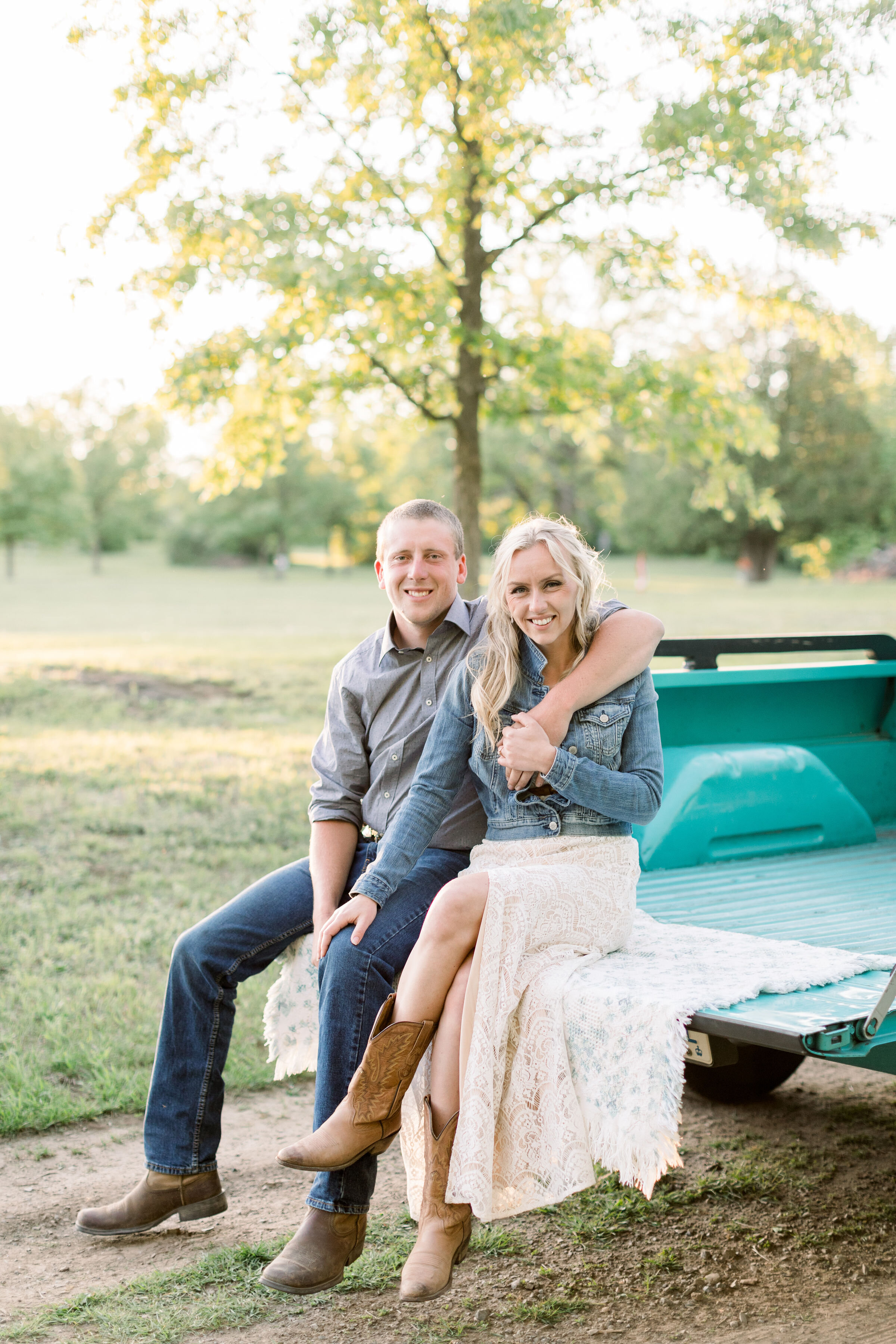  Ottawa, Canada photographer, Chelsea Mason photography captures this engaged couple sitting in the bed of this vintage Ford pickup truck during their engagement session. southern styled engagement outfit ford pickup truck #ChelseaMasonPhotography #O