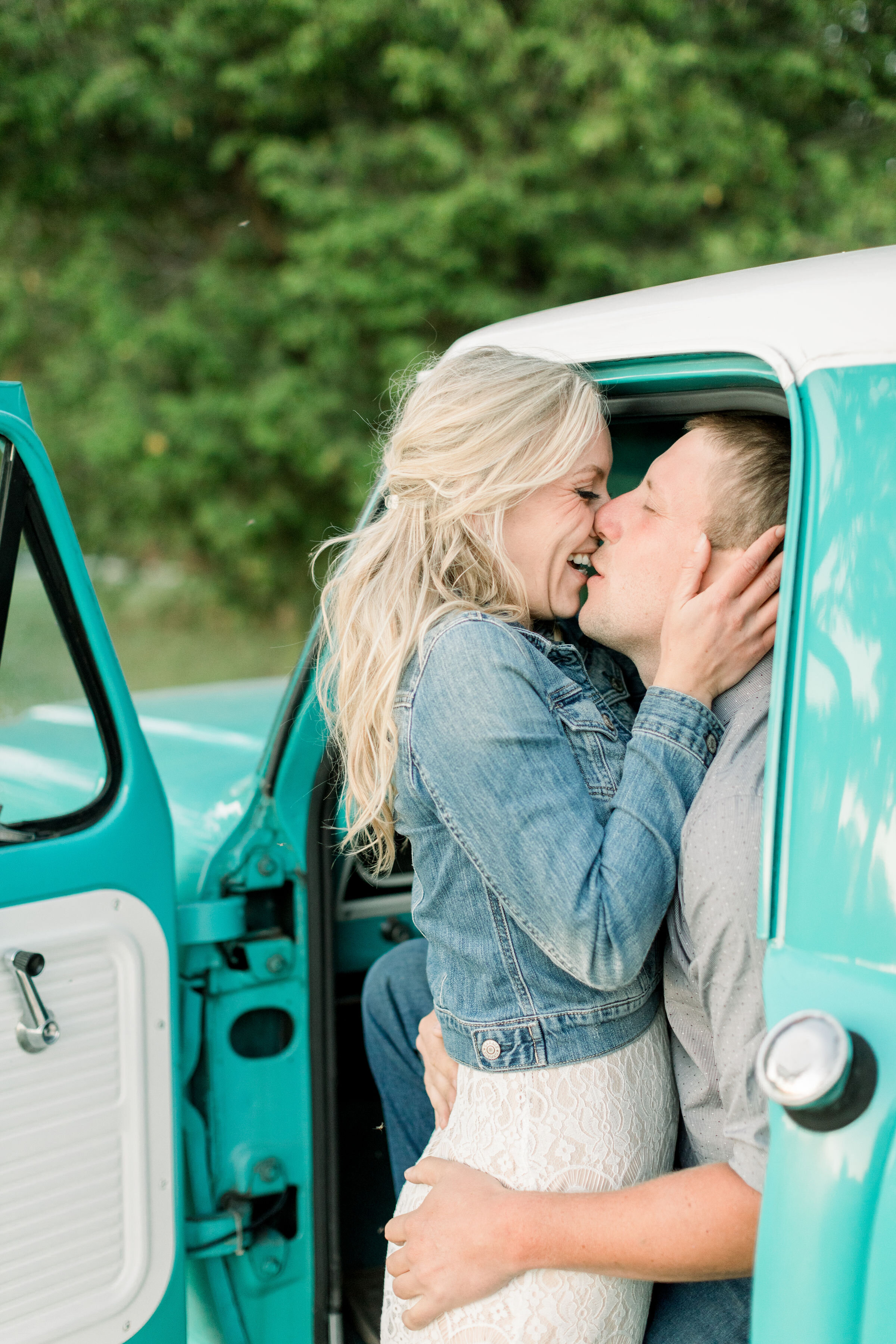  While leaning against this vintage Tiffany Blue pickup truck, Ottawa, Ontario couples photographer, Chelsea Mason Photography captures this couple tenderly kissing. engaged couple arms around one another couples poses Ottawa Canada photographer #Che