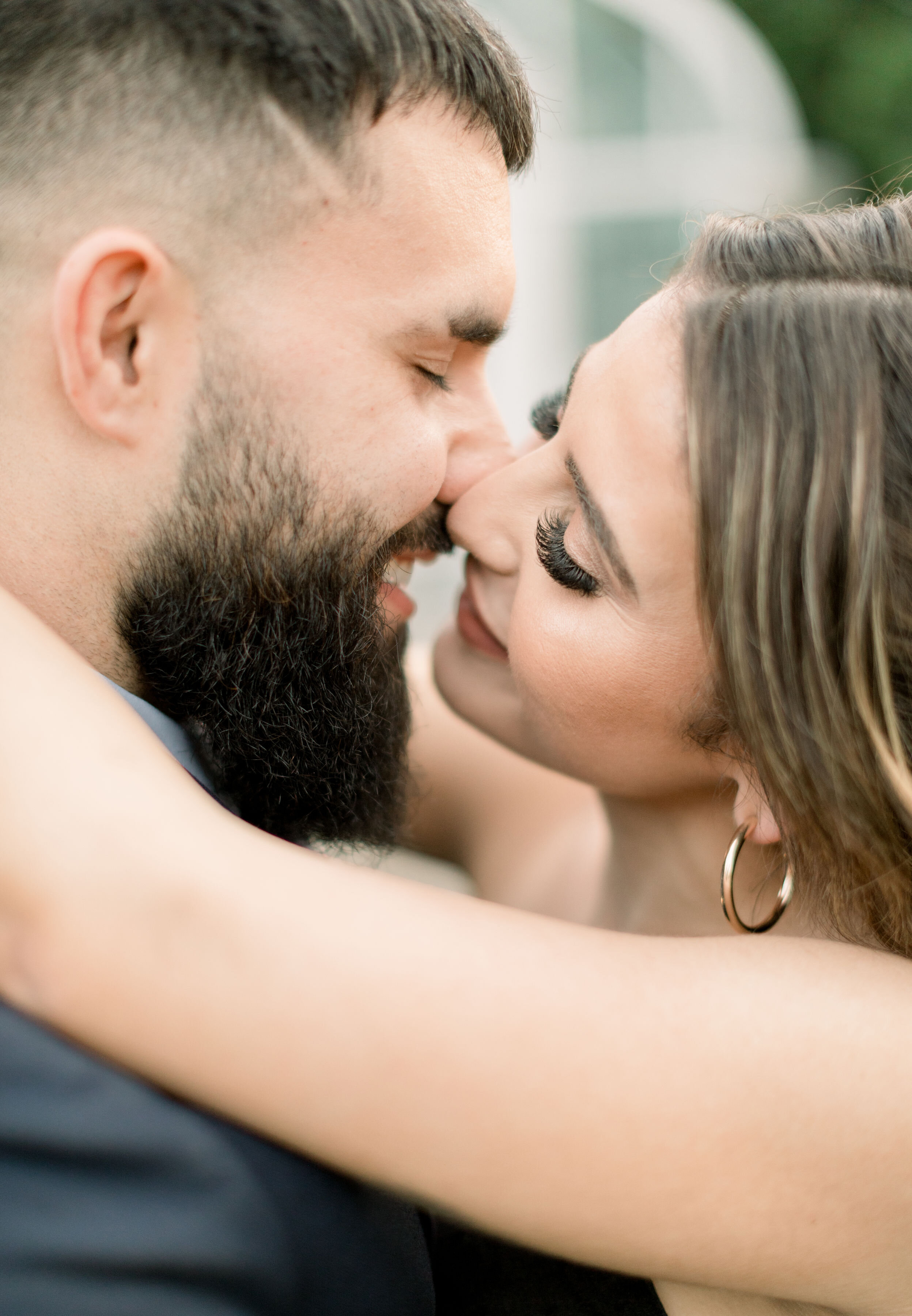  Ottawa, Ontario photographer, Chelsea Mason Photography captures an up close photo of this engaged couple leaning in for a kiss from an arial view. arial view of couple kissing up close kissing photo women's false lashes formal engagement photos #Ch