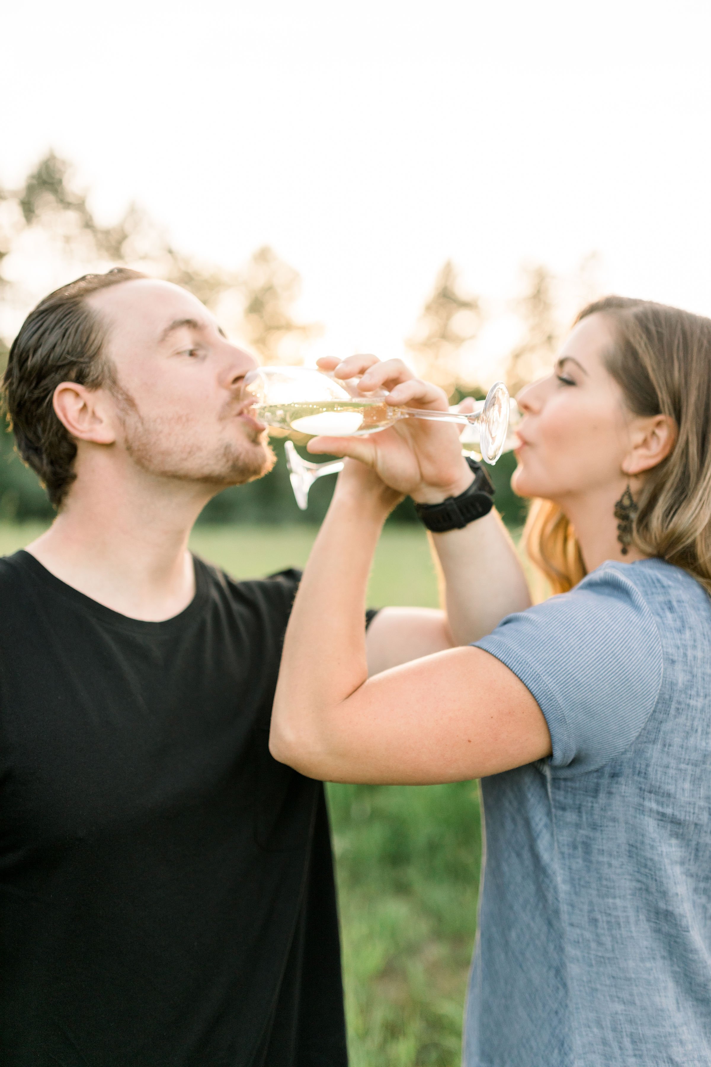  Chelsea Mason Photography captures an engaged couple toasting to their new life together. celebrating engagement toasting engagement #chelseamasonphotography #chelseamasonengagements #Ottawaengagments #Almonteengagementphotographer #outdoorengagment