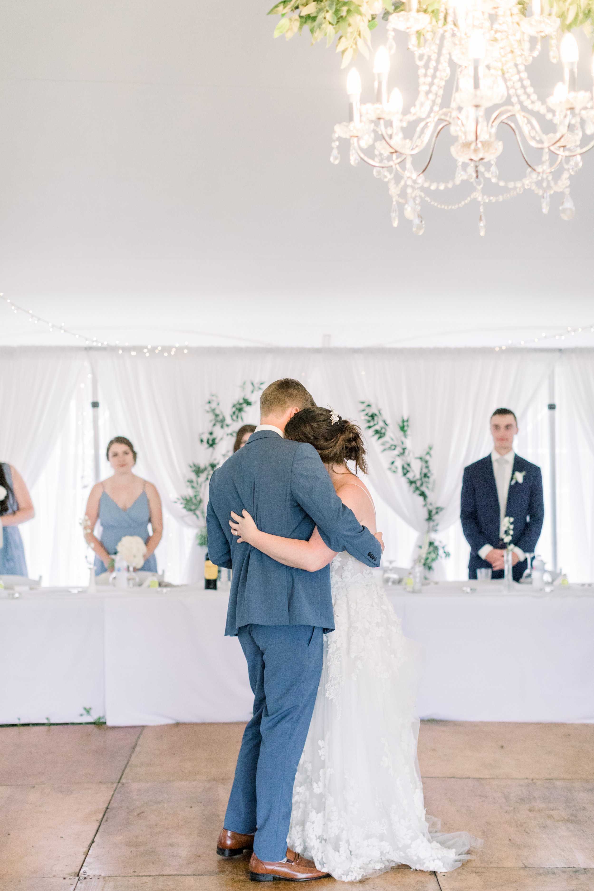  First dance with newlyweds under an outdoor wedding tent in Boulter by Chelsea Mason Photography. first dance tent wedding Boulter #chelseamasonphotography #chelseamasonweddings #Ontarioweddings #Boulterweddingphotographer #laceweddinggown 