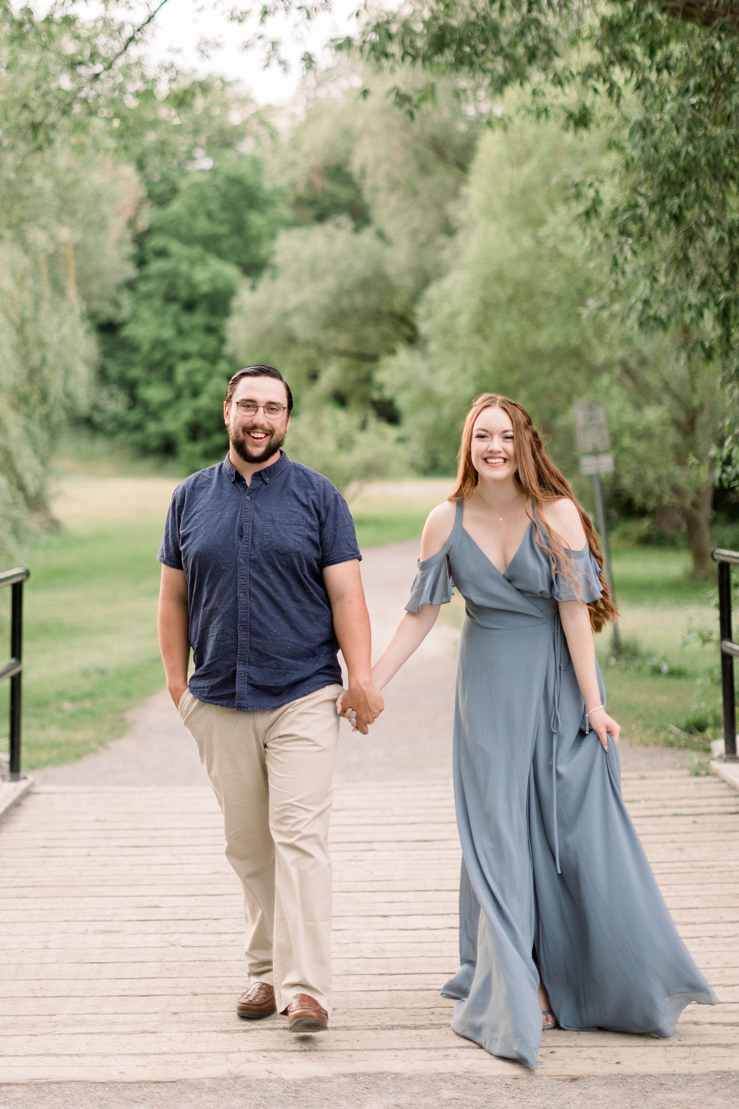  Wedding announcement portrait of a couple wearing blue at Dominion Arboretum in Ottawa by Chelsea Mason Photography. engagement portrait #chelseamasonphotography #chelseamasonengagements #Ottawaengagements #DominonArboretum #Ottawaphotographers&nbsp