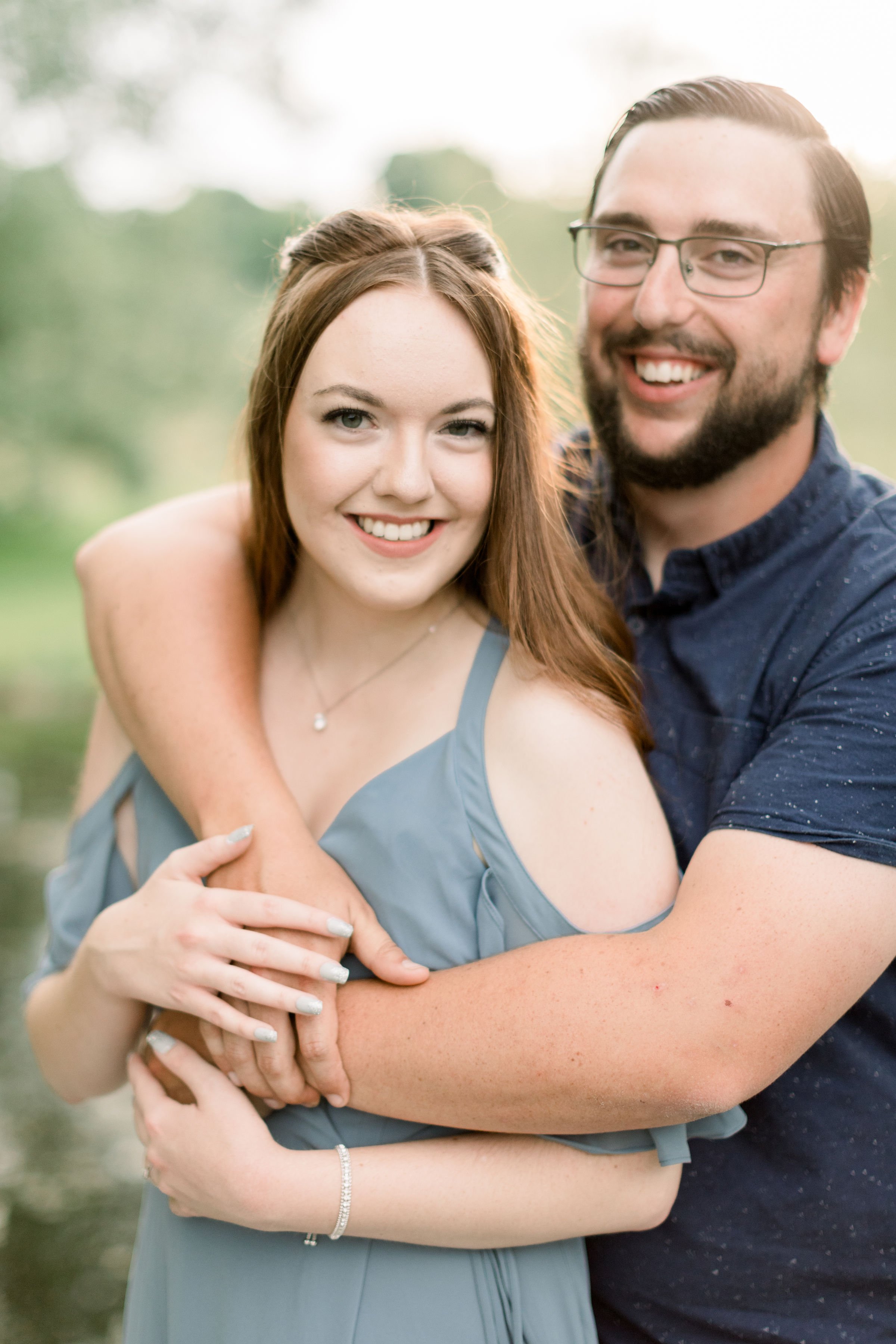  Chelsea Mason Photography captures a close-up portrait of an engaged couple in golden sunlight. close-up portrait engagements Ottawa photog #chelseamasonphotography #chelseamasonengagements #Ottawaengagements #DominonArboretum #Ottawaphotographers&n