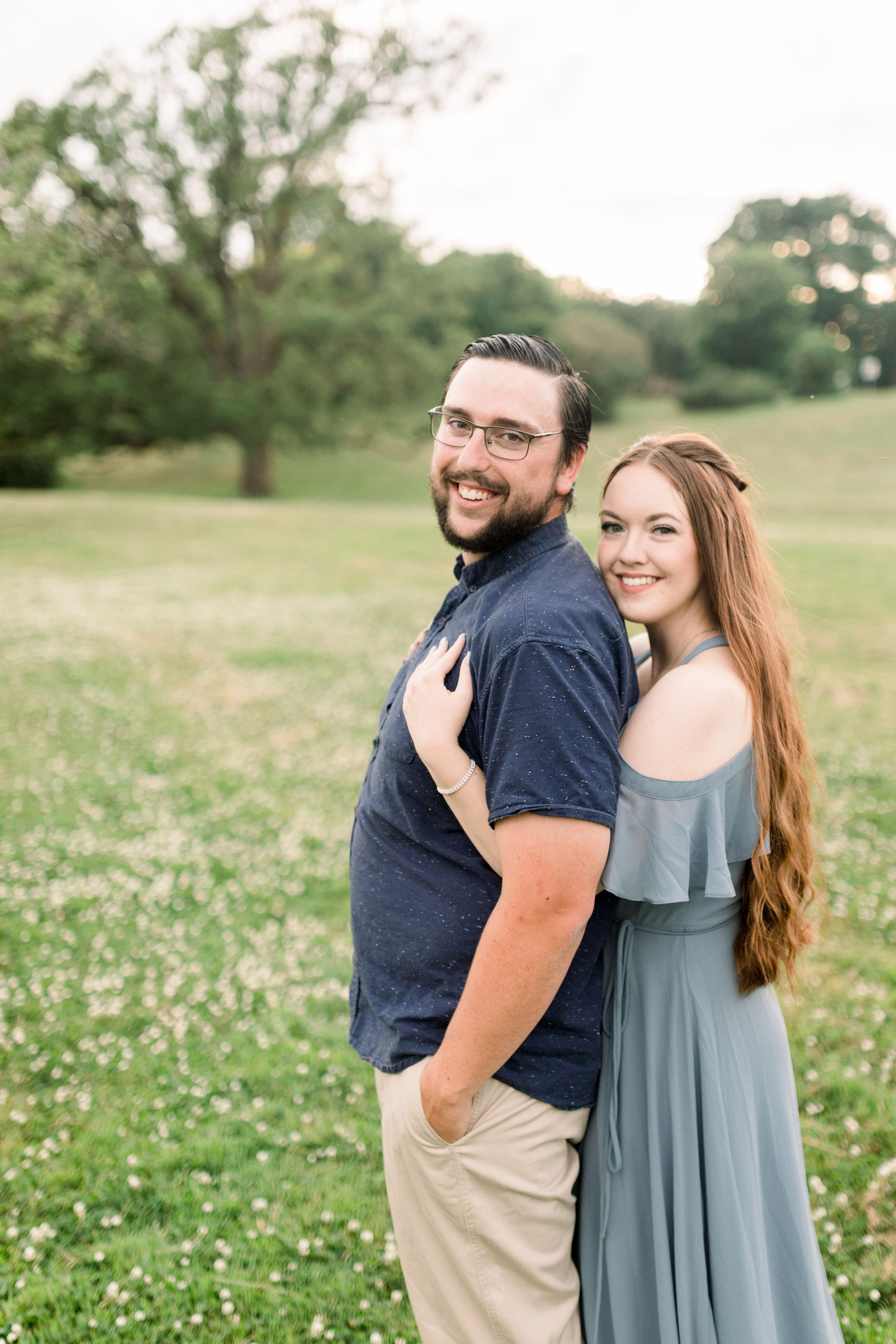  In a wildflower field in Ottawa, an engaged couple pose during a session with Chelsea Mason Photography. summer field portraits #chelseamasonphotography #chelseamasonengagements #Ottawaengagements #DominonArboretum #Ottawaphotographers&nbsp; 